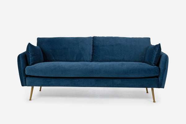 park sofa shown in blue velvet with gold legs