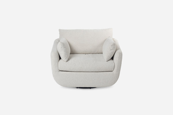 front view of the park swivel armchair in bouclé