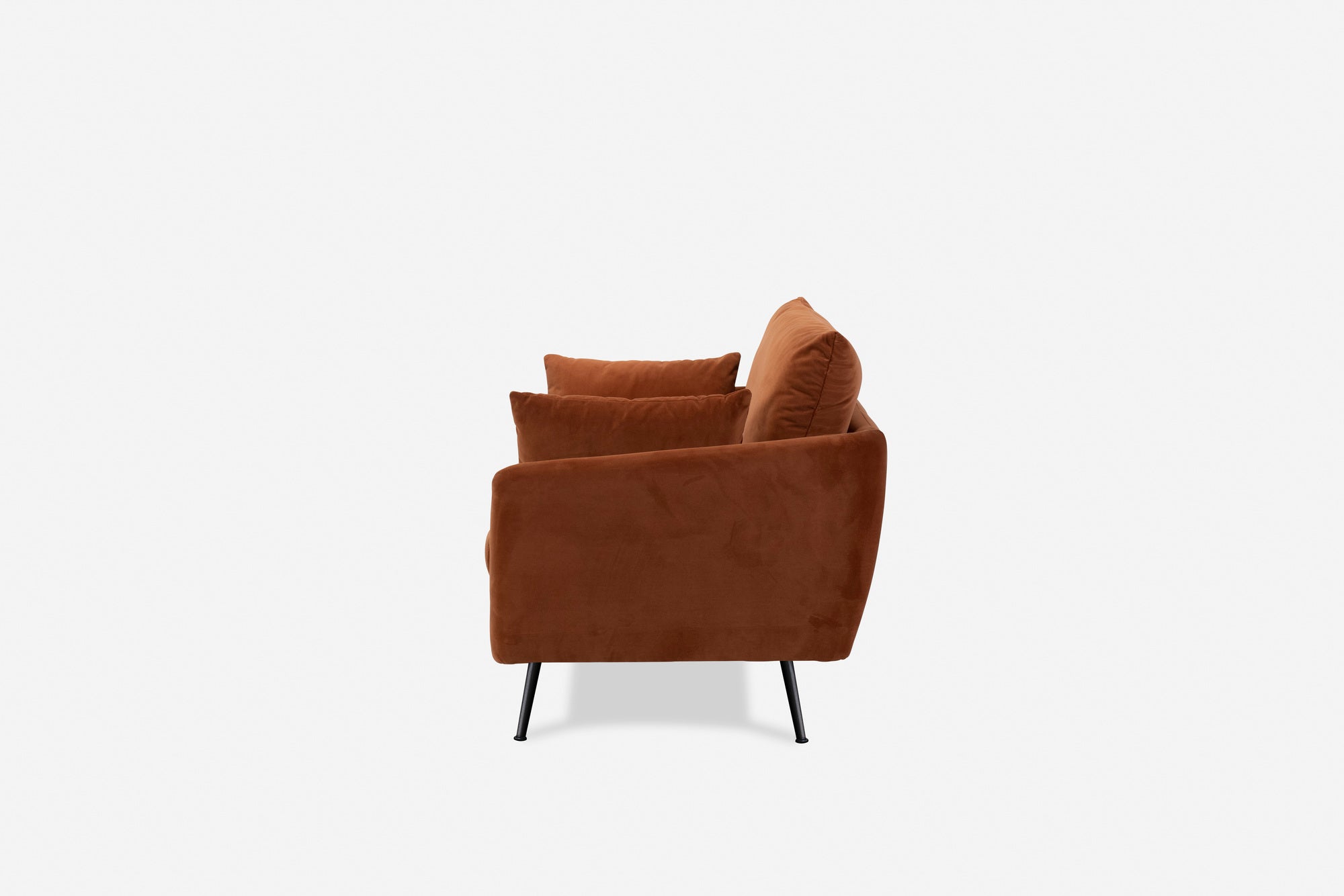 park armchair shown in rust velvet with black legs