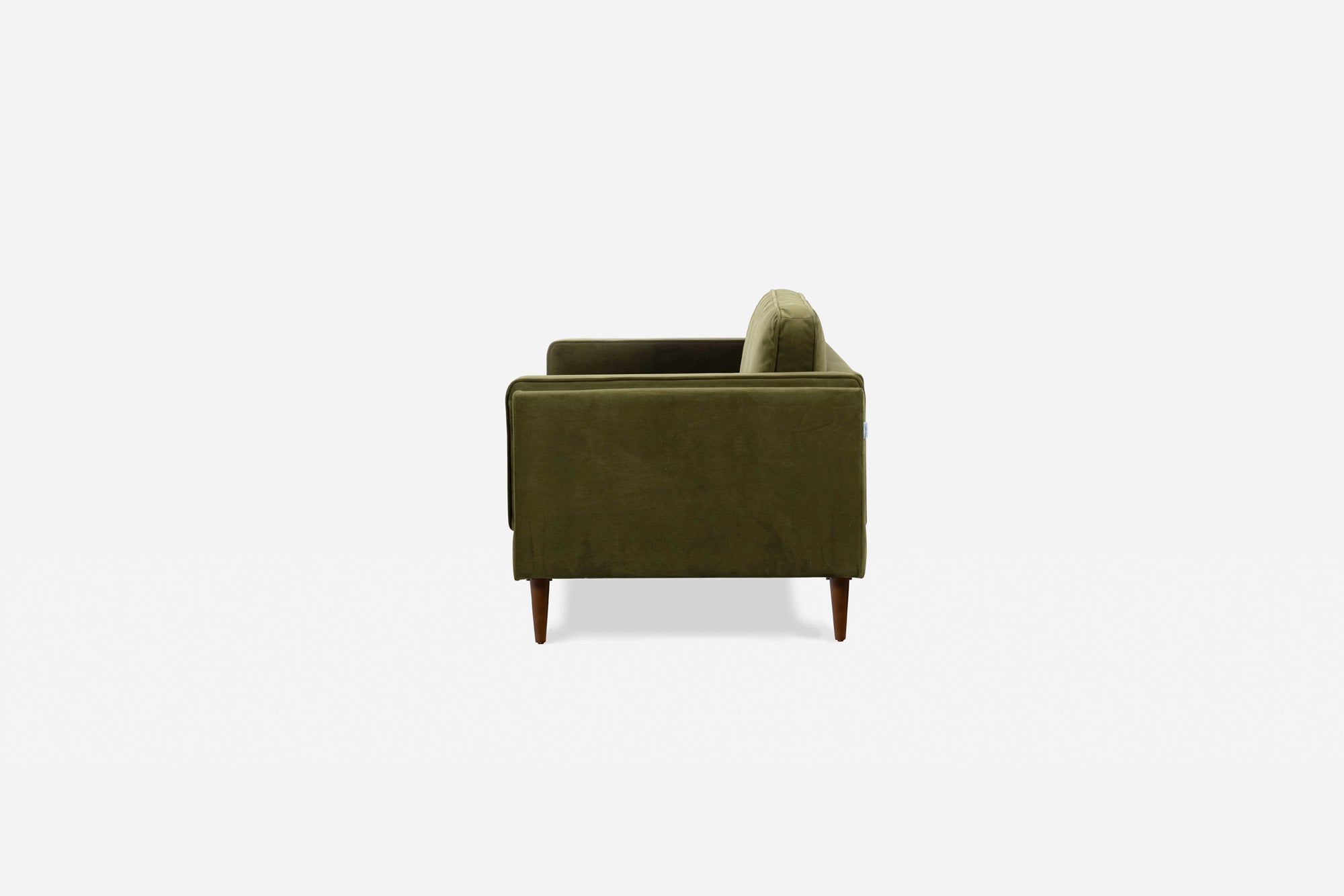 albany armchair shown in olive velvet with walnut legs