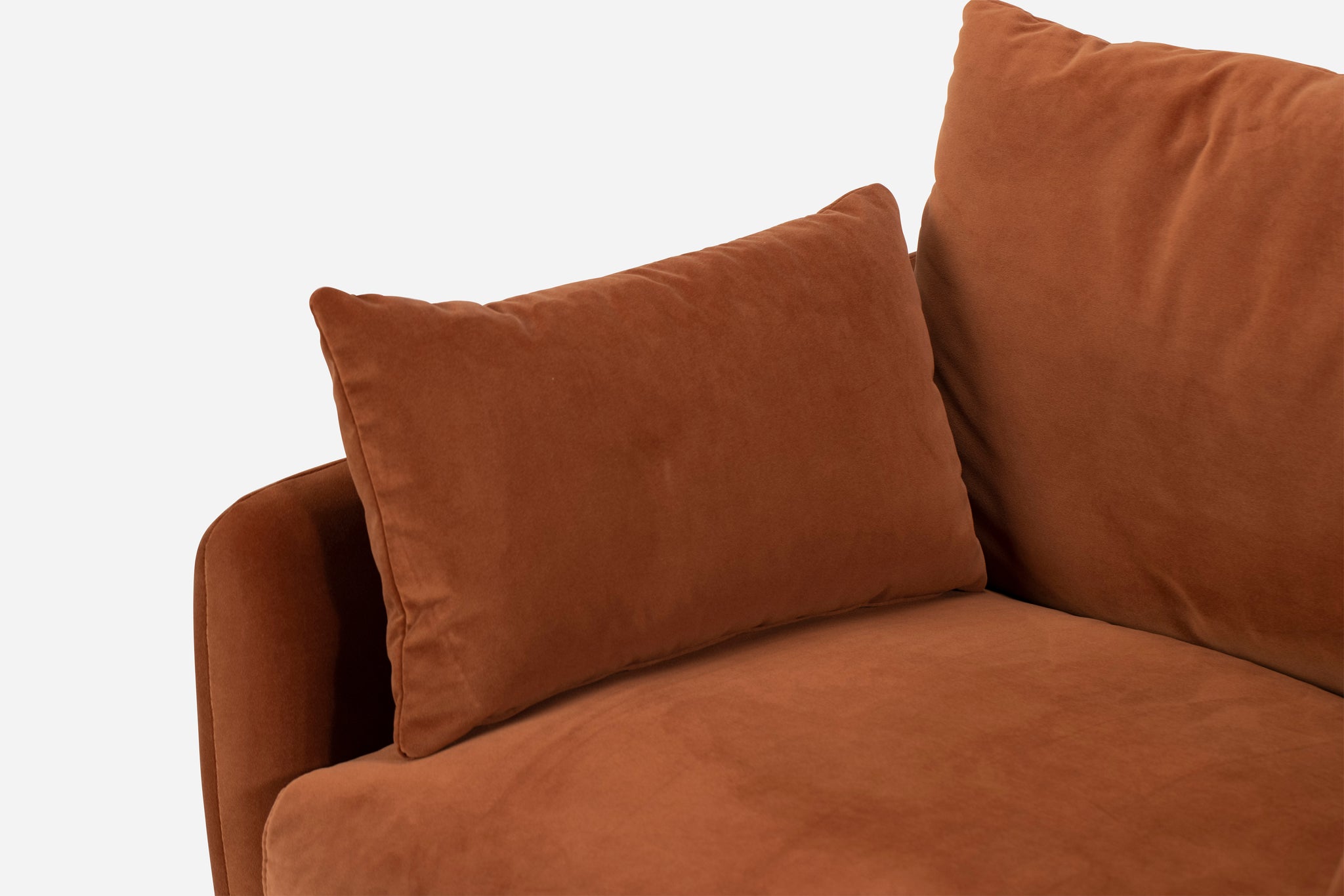 park sofa shown in rust velvet with gold legs