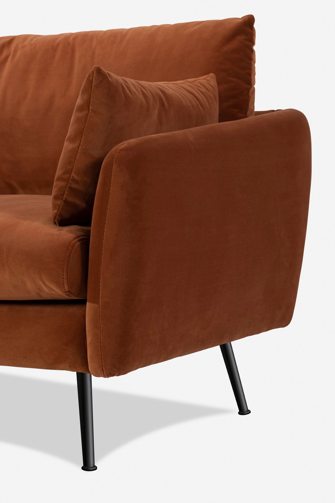 park armchair shown in rust velvet with black legs