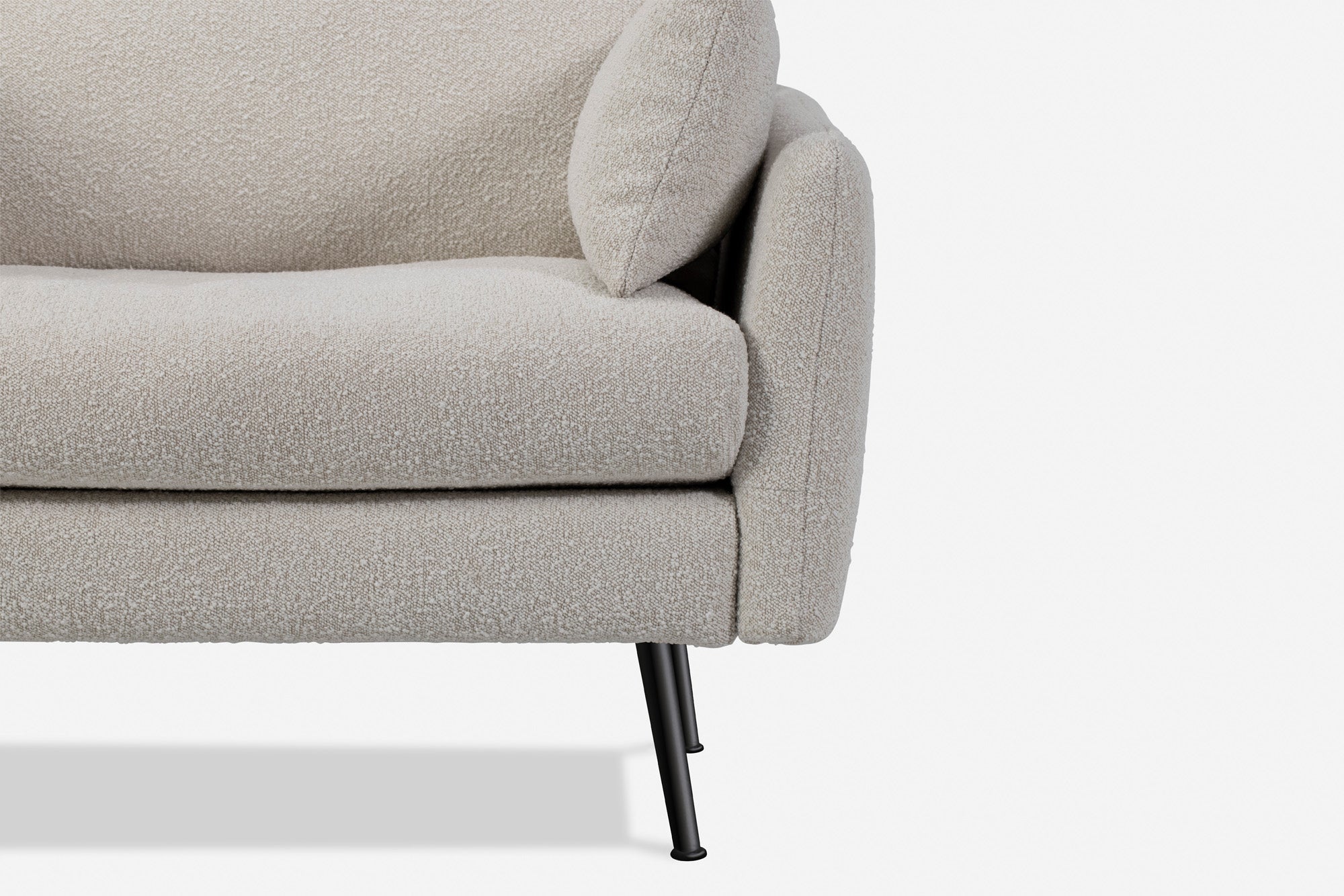 park sectional sofa shown in bouclé with black legs