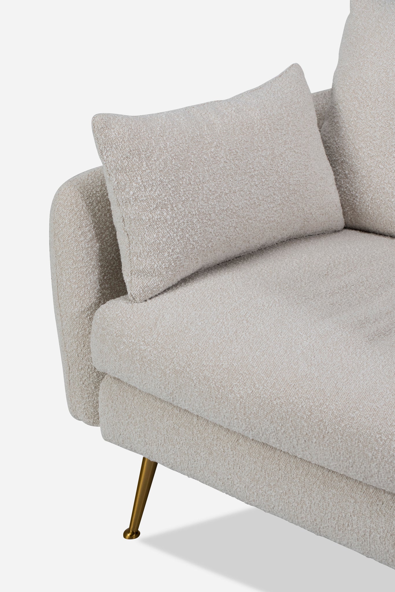 park sofa shown in bouclé with gold legs