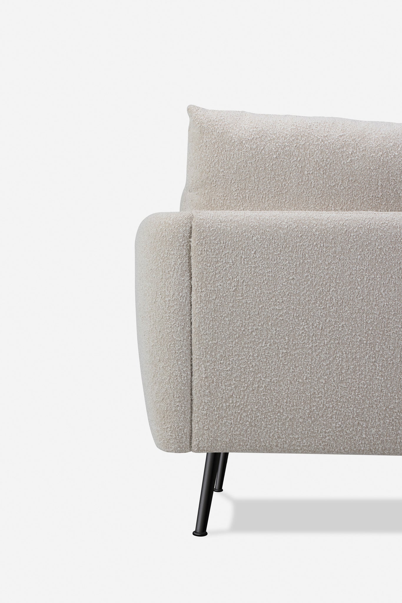 park armchair shown in bouclé with black legs