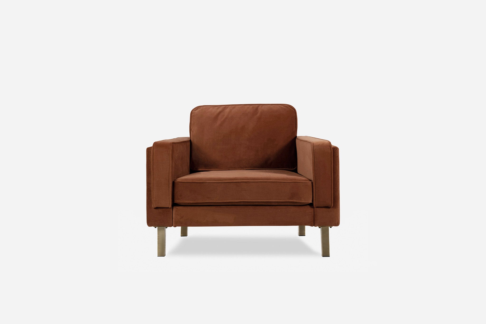 albany armchair shown in rust velvet with gold legs