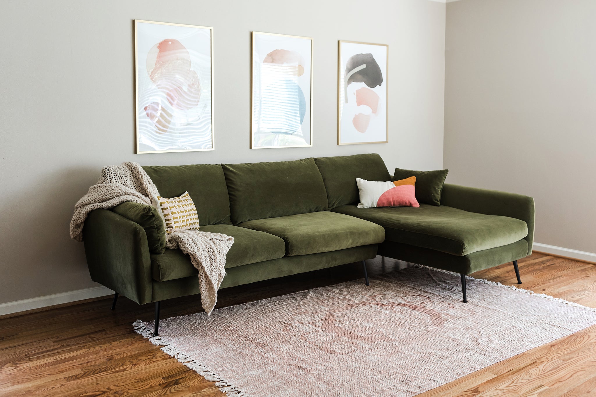 park sectional sofa shown in olive velvet with black legs right facing