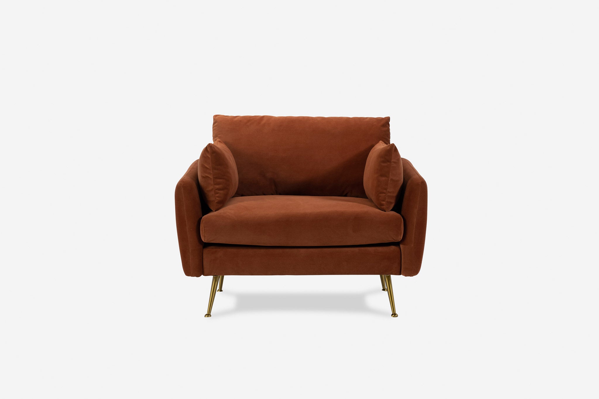 park armchair shown in rust velvet with gold legs