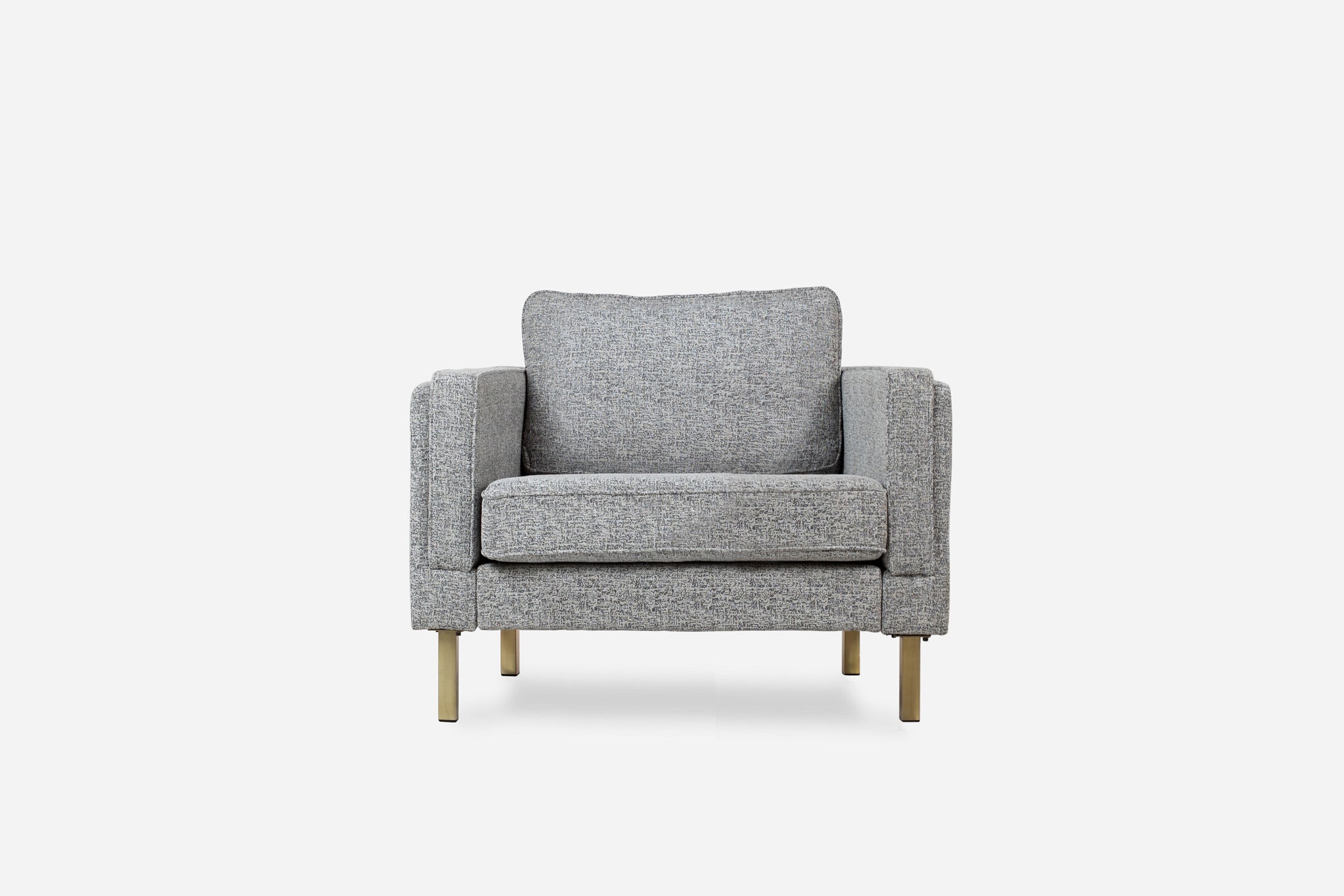 albany armchair shown in grey fabric with gold legs