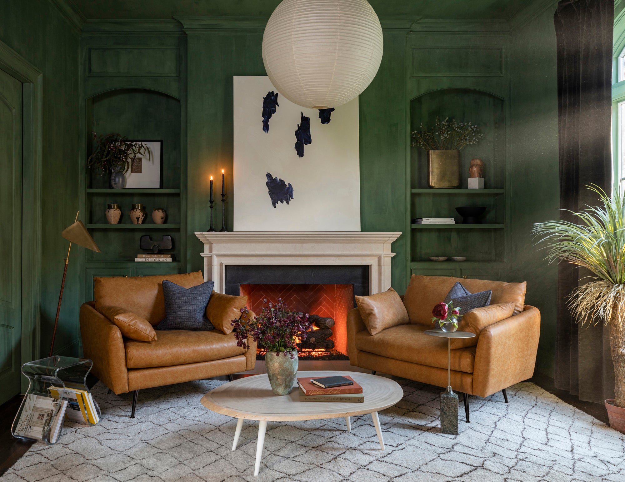 park armchair shown in distressed vegan leather with black legs