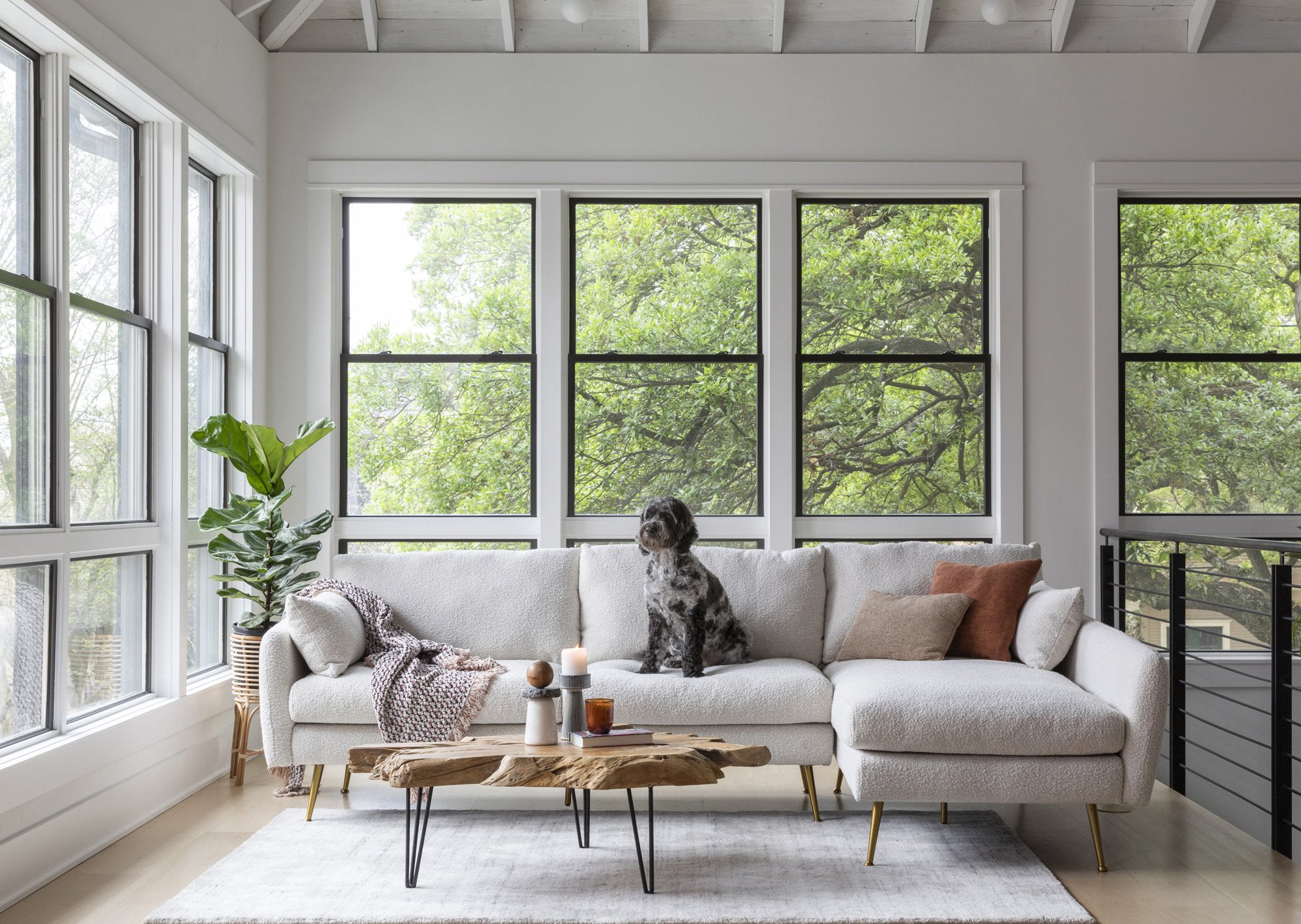 park sectional sofa shown in bouclé with gold legs right facing