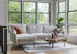 Bouclé black left facing | Park Sectional Sofa shown in Bouclé with black legs left facing