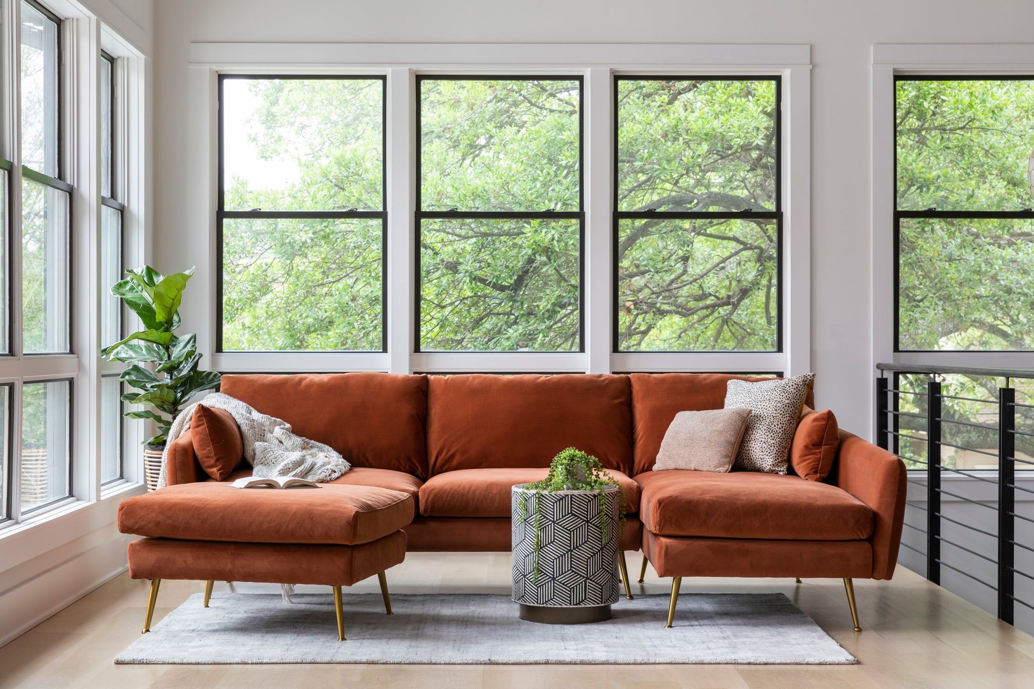 park sectional sofa shown in rust velvet with gold legs right facing