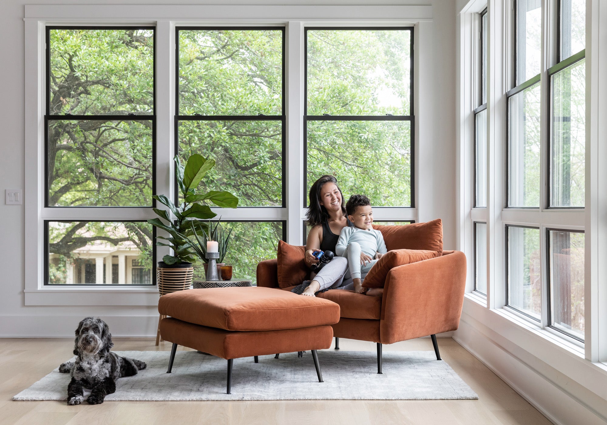park armchair shown in rust velvet with black legs