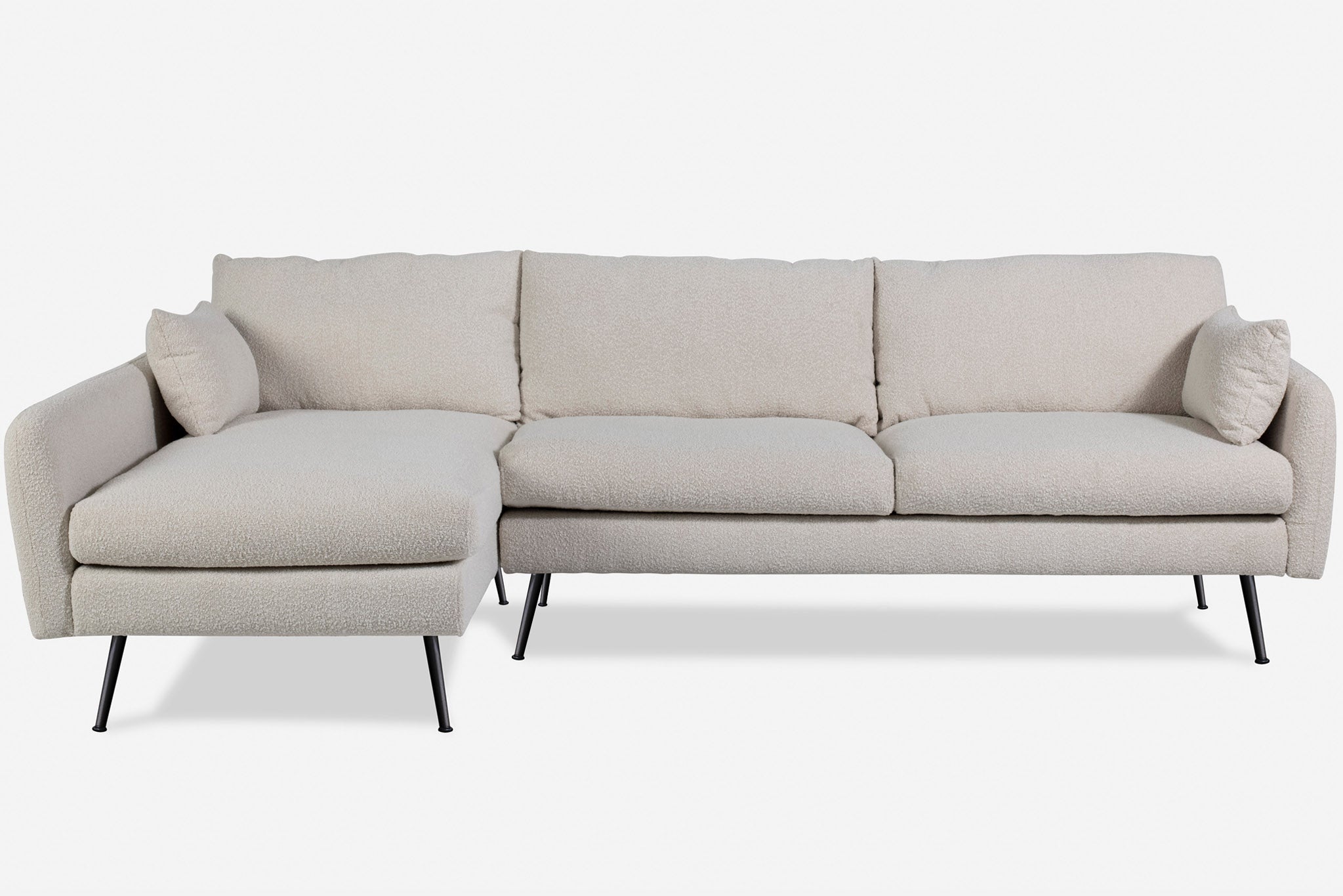 park sectional sofa shown in bouclé with black legs left facing