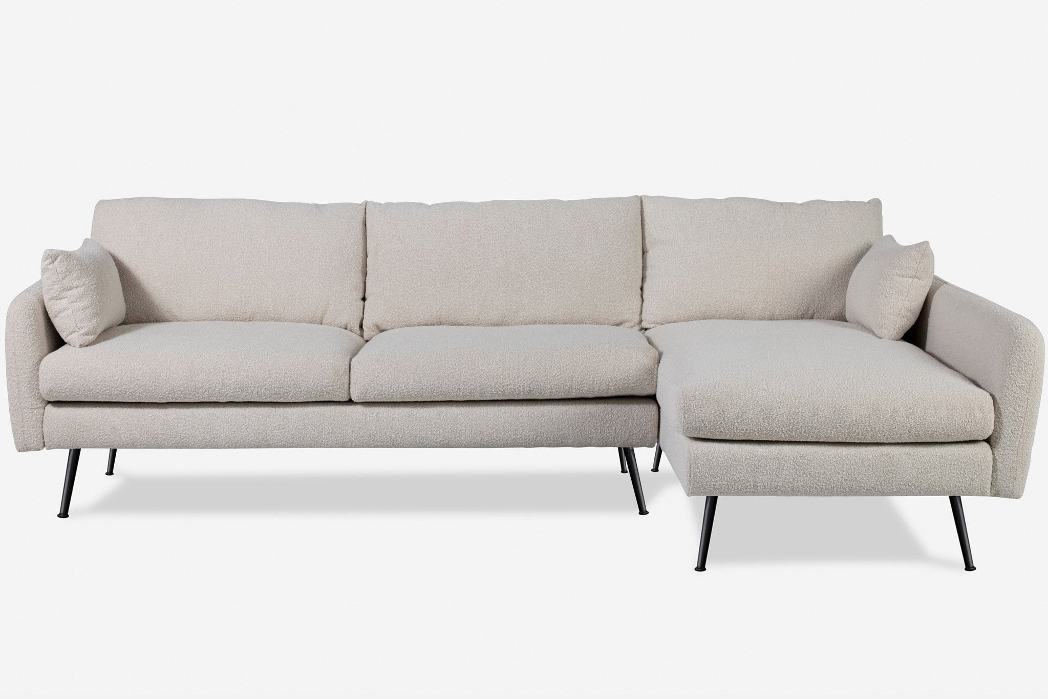 park sectional sofa shown in bouclé with black legs right facing