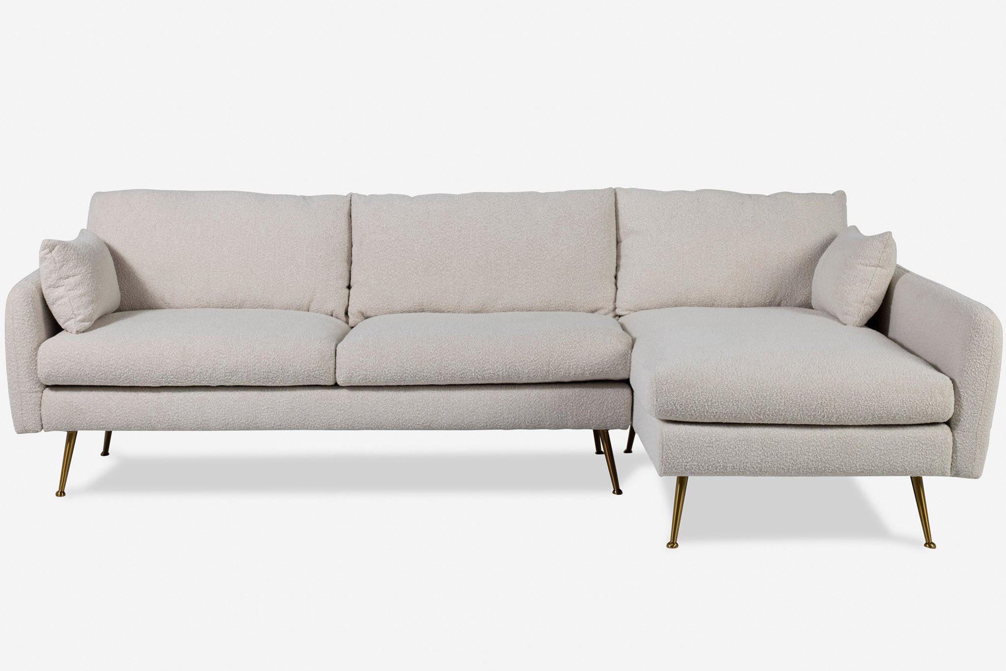 park sectional sofa shown in bouclé with gold legs right facing