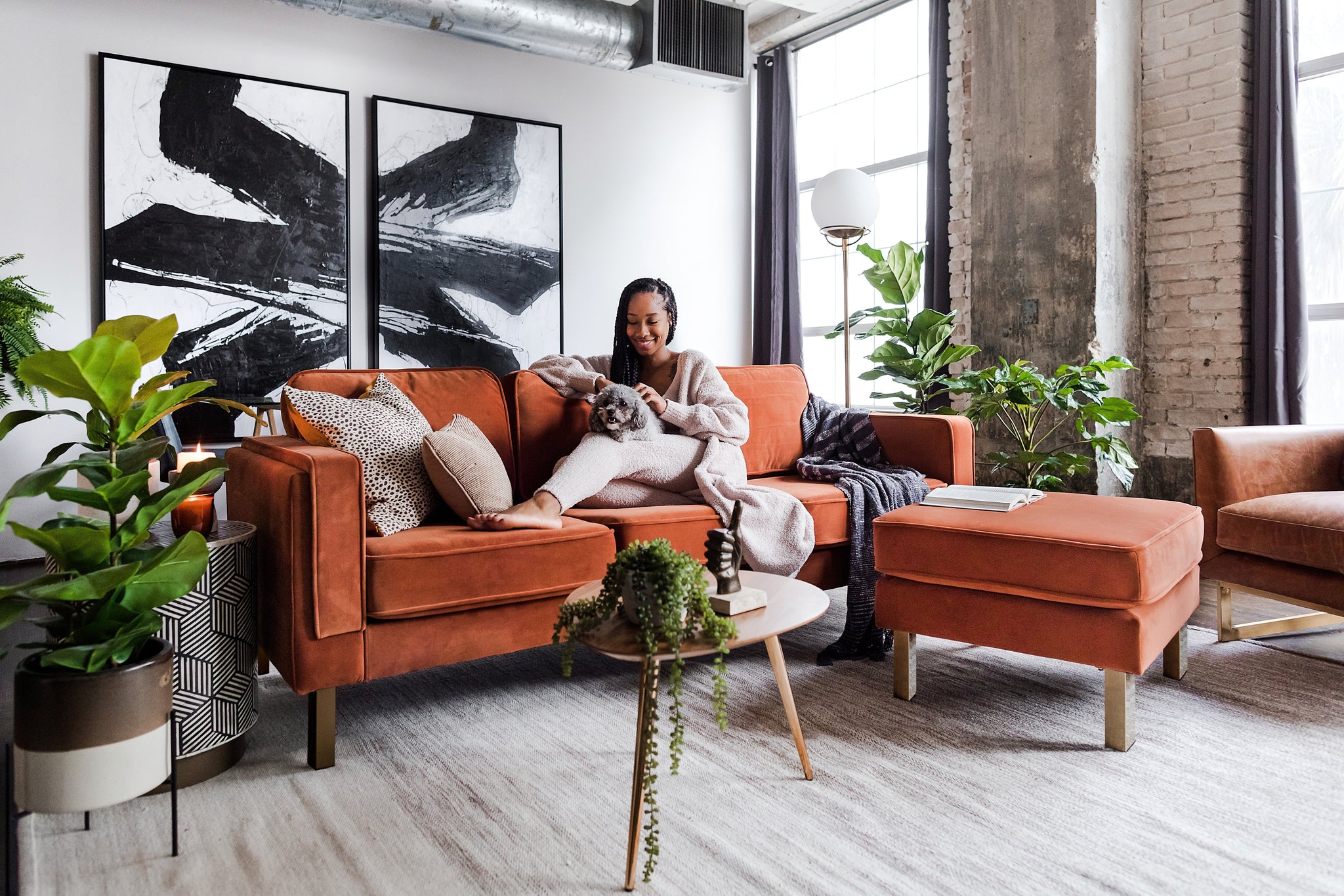 albany sofa shown in rust velvet with gold legs