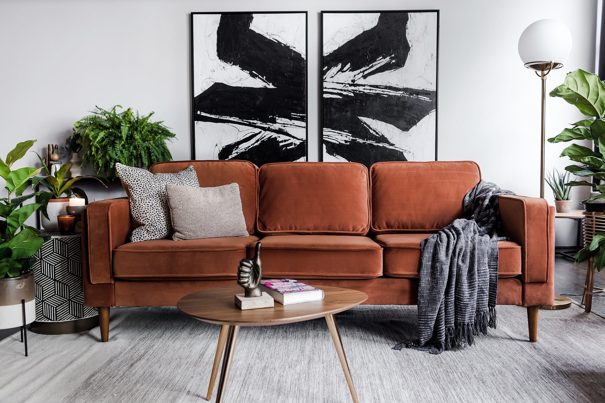 albany sofa shown in rust velvet with walnut legs