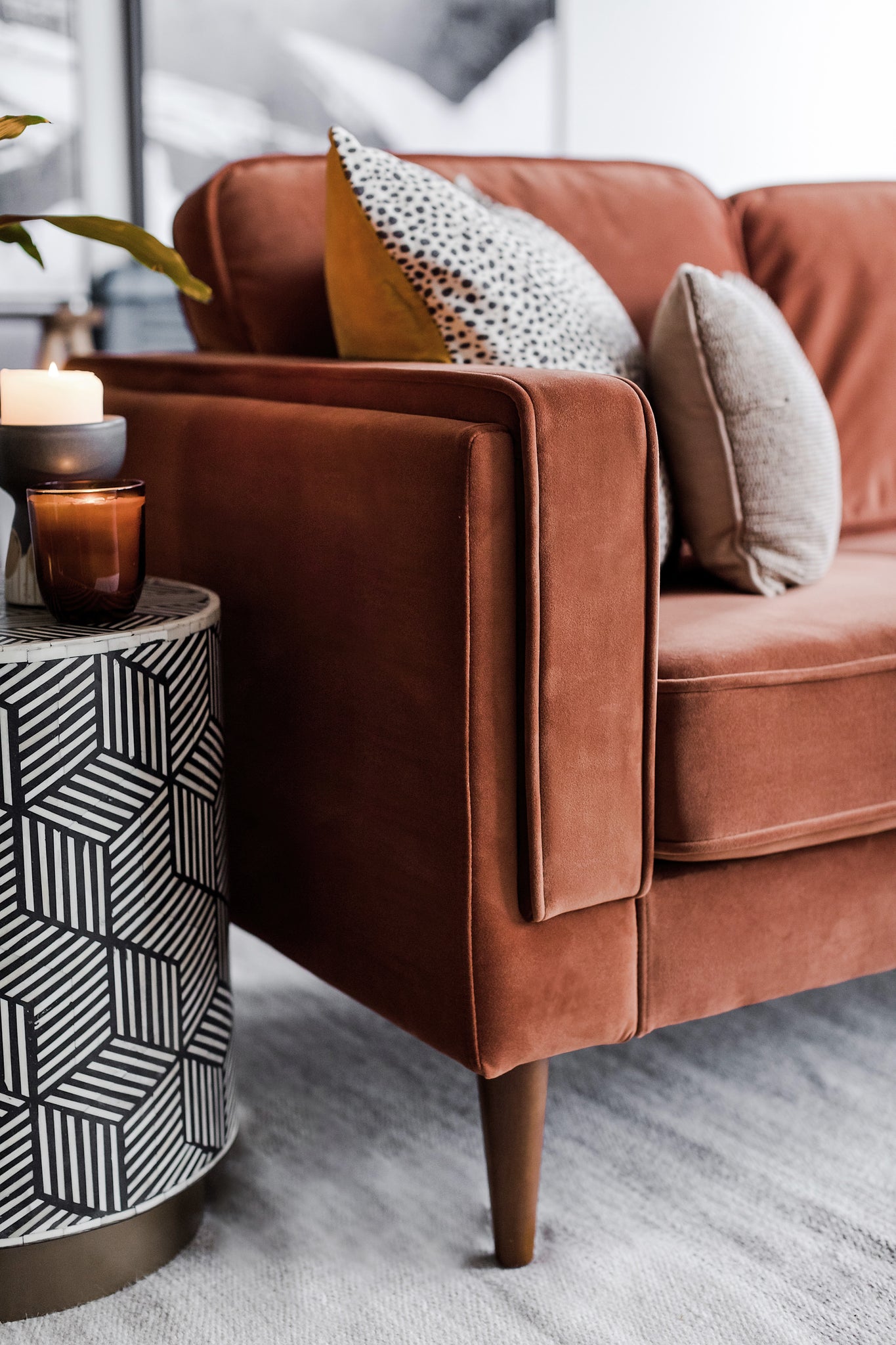 albany sofa shown in rust velvet with walnut legs