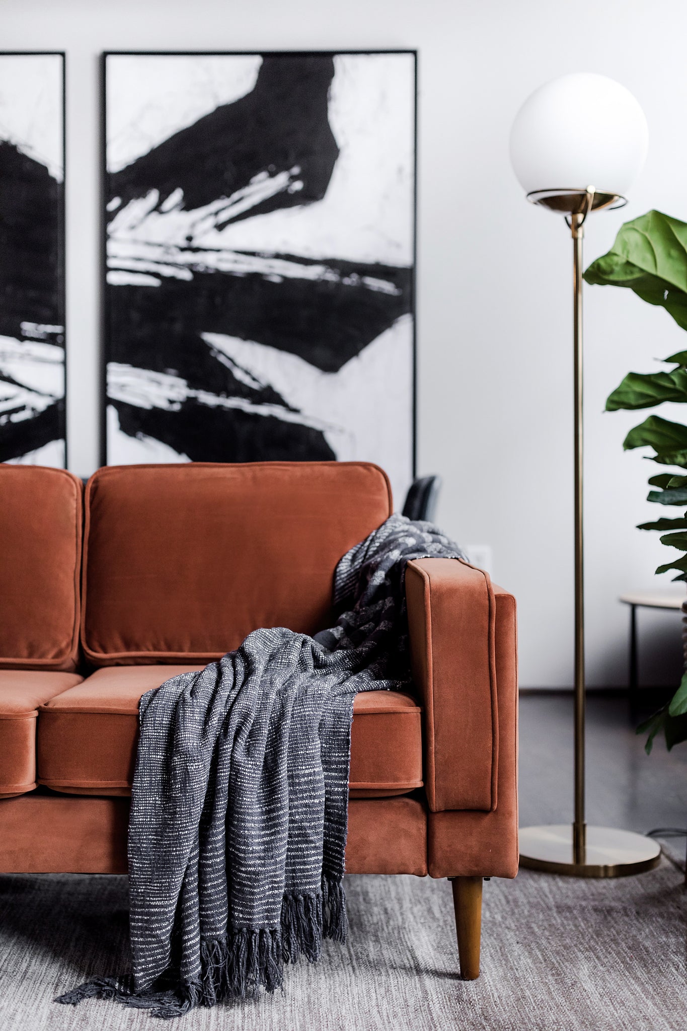 albany sofa shown in rust velvet with walnut legs