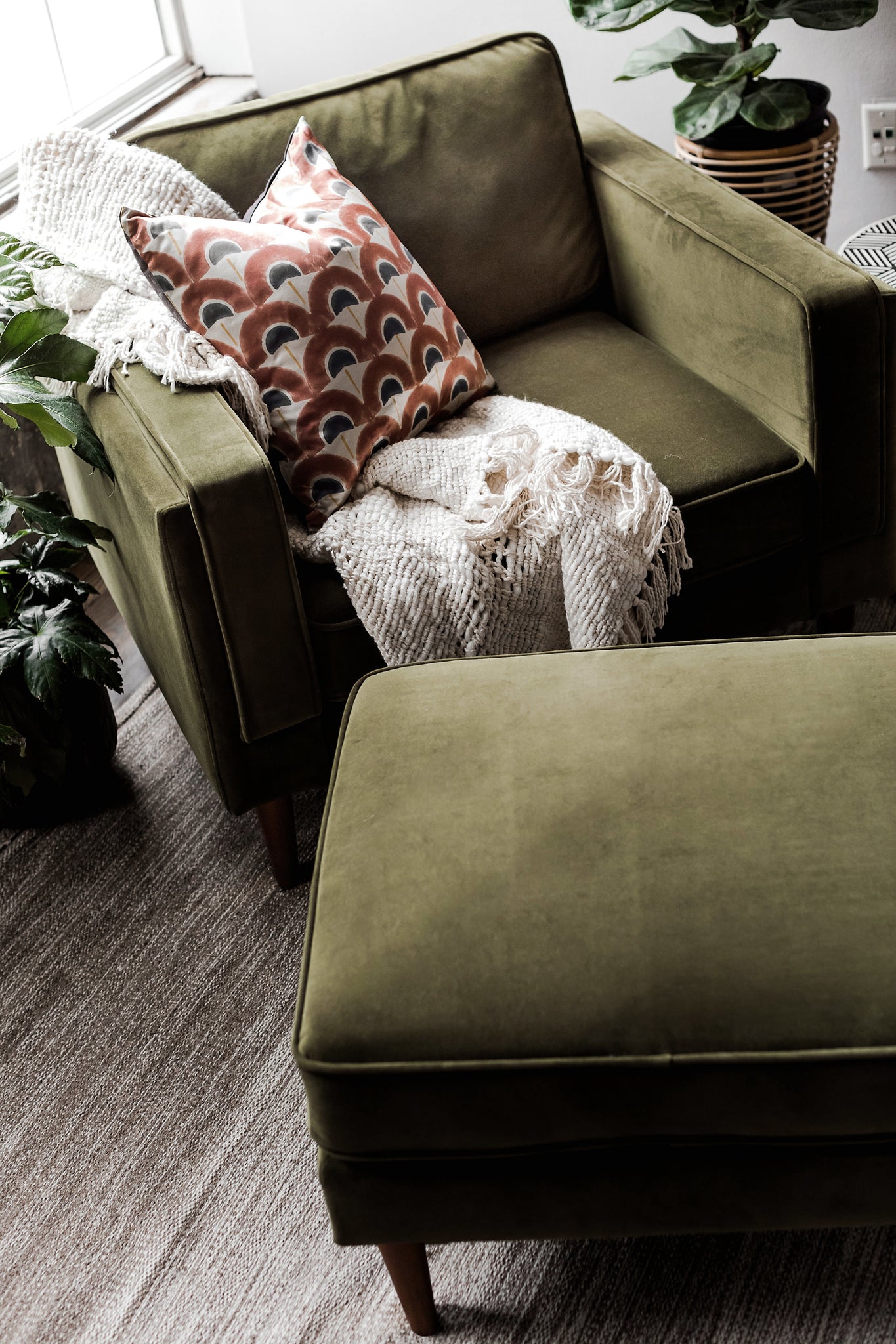 albany armchair shown in olive velvet with walnut legs