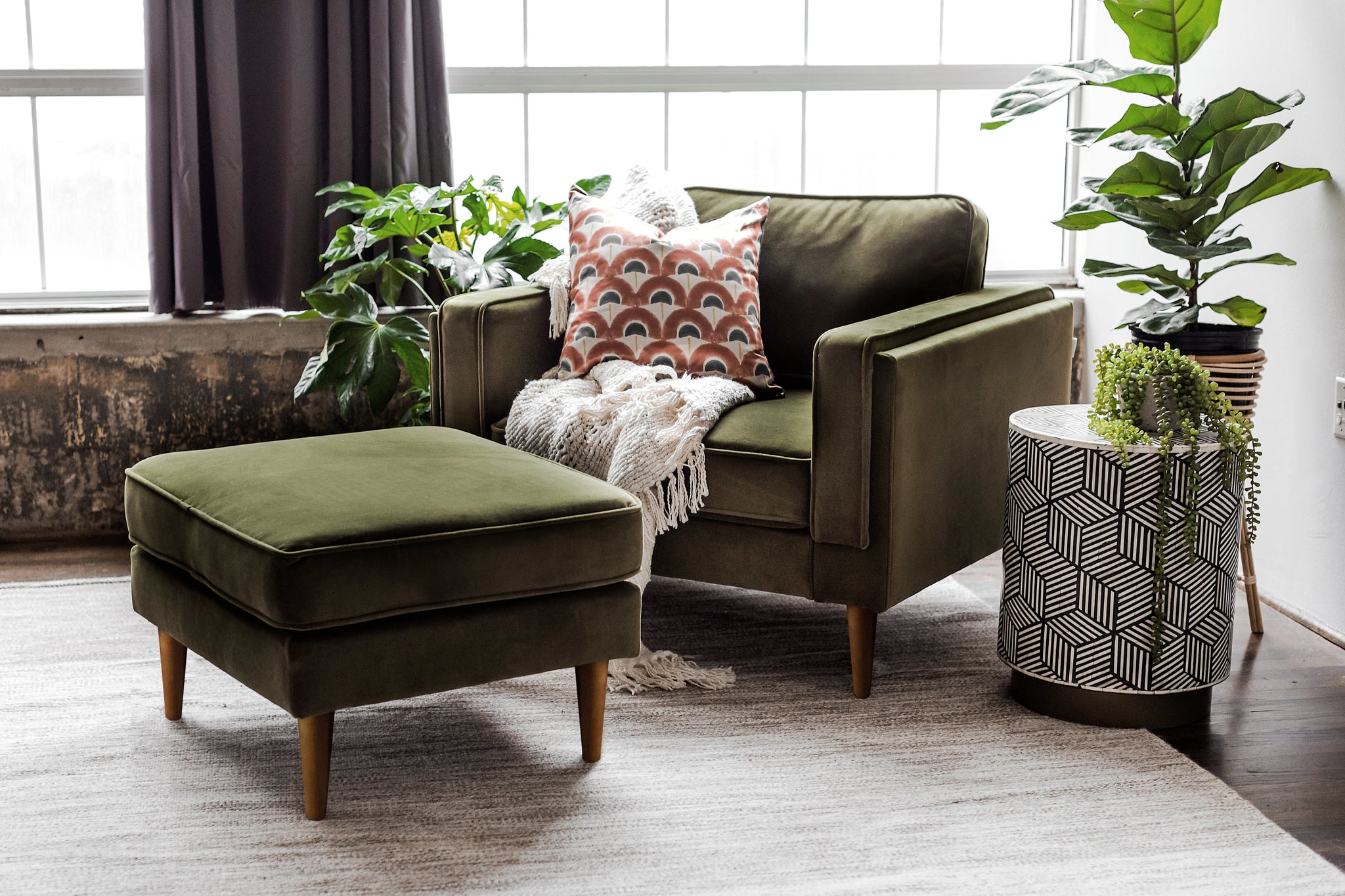 albany ottoman shown in olive velvet with walnut legs