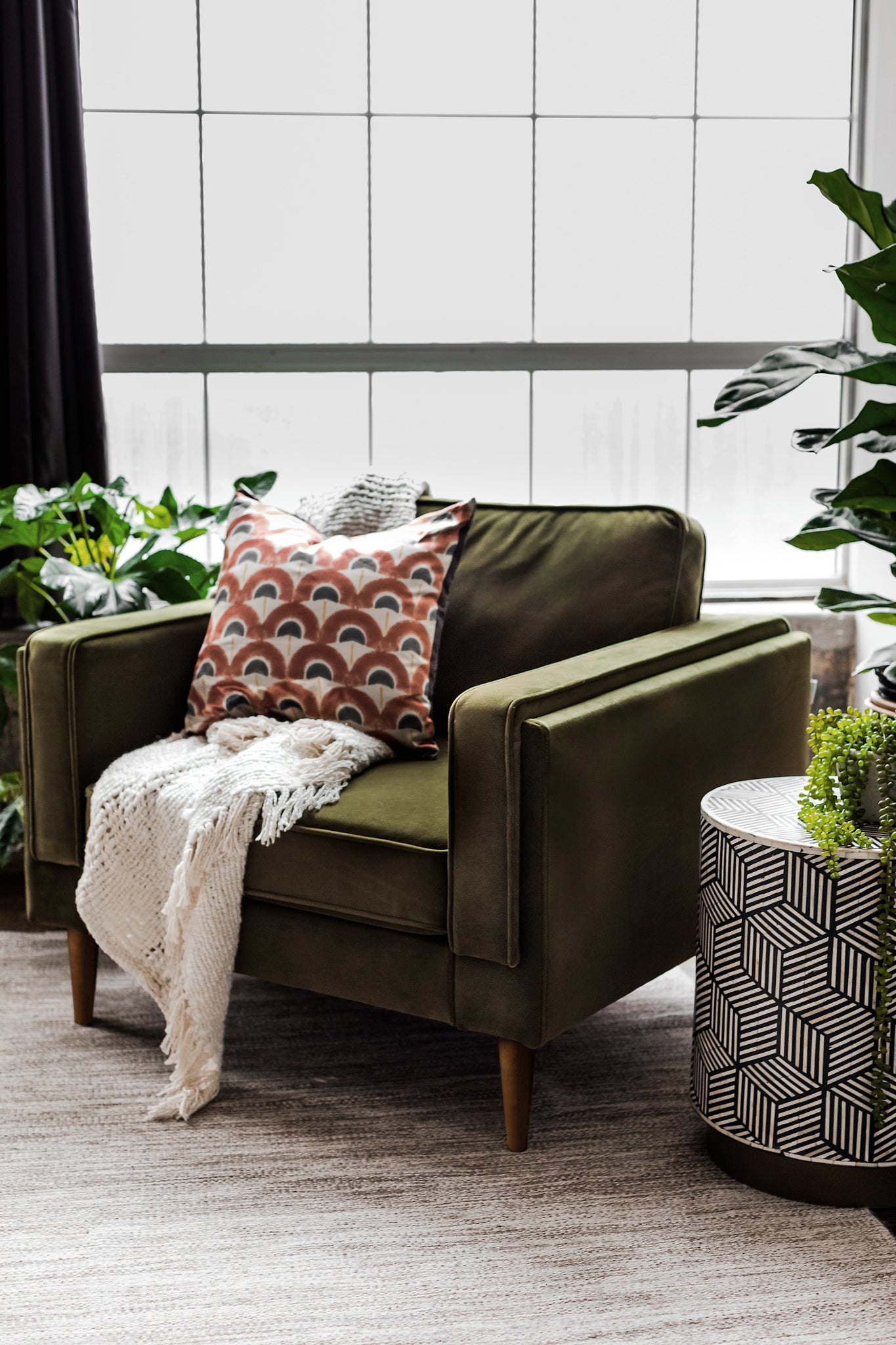 albany armchair shown in olive velvet with walnut legs
