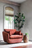 Rust velvet | Park swivel armchair in rust velvet in a living room setting