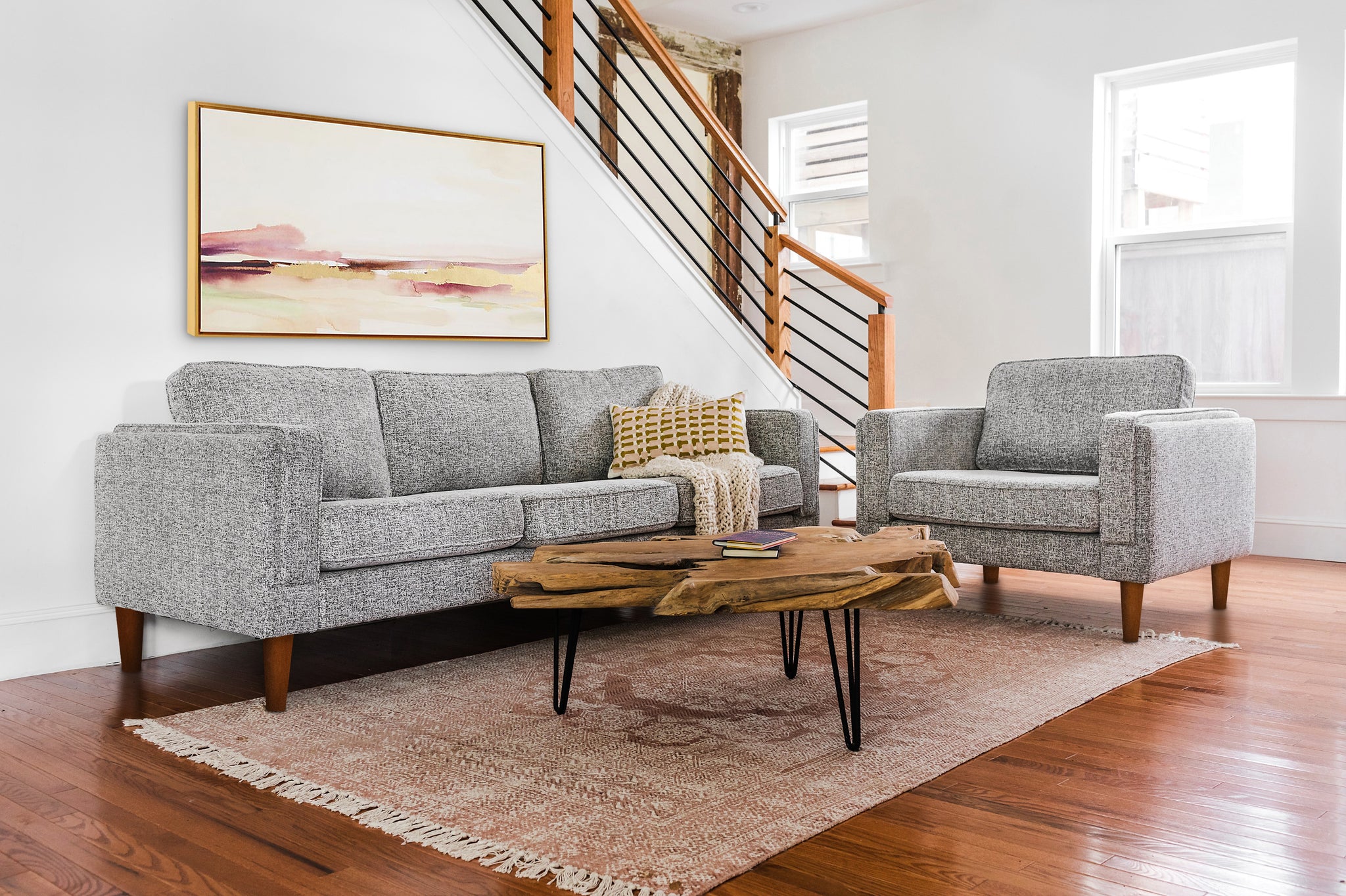 albany armchair shown in grey fabric with walnut legs