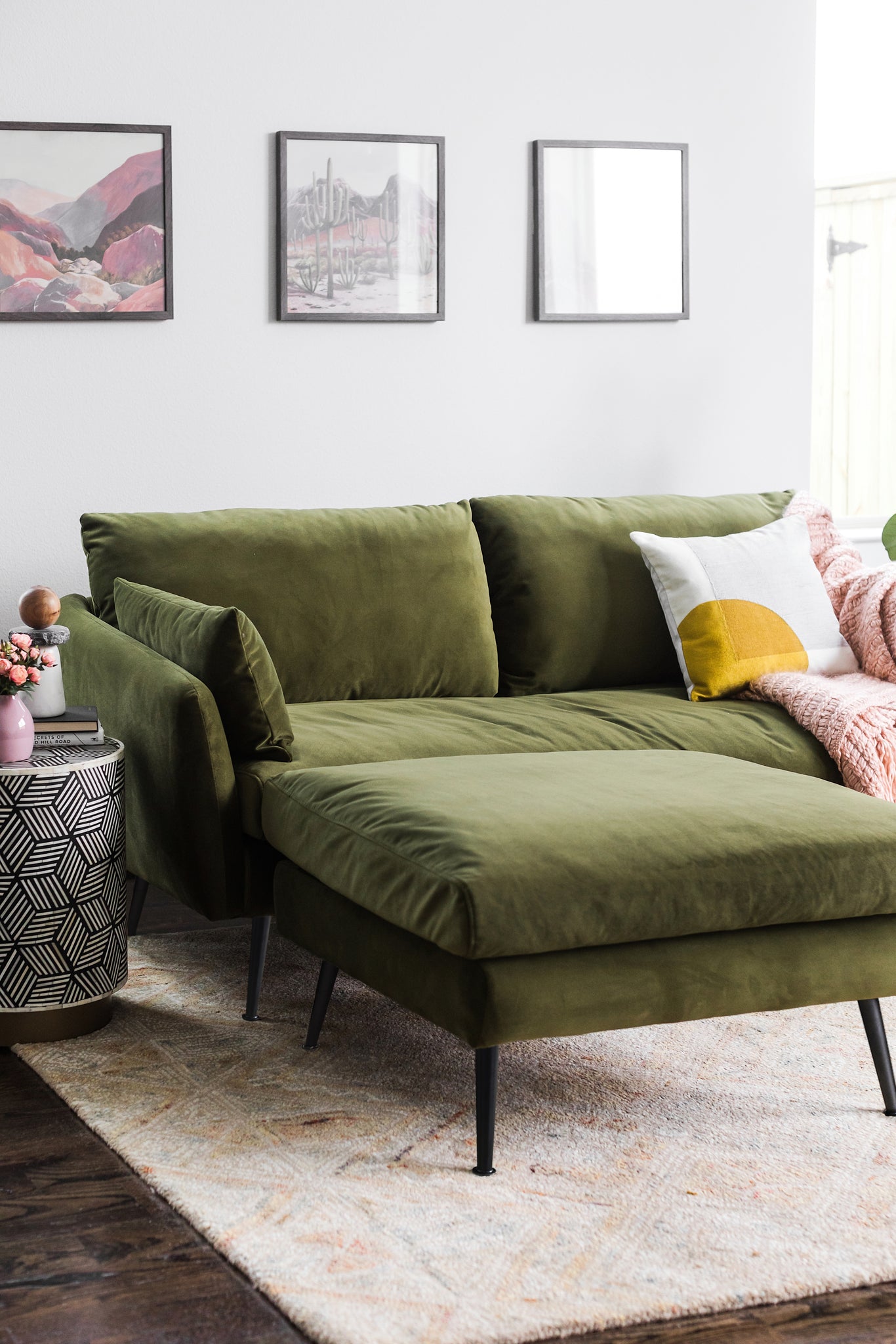 park sofa shown in olive velvet with black legs