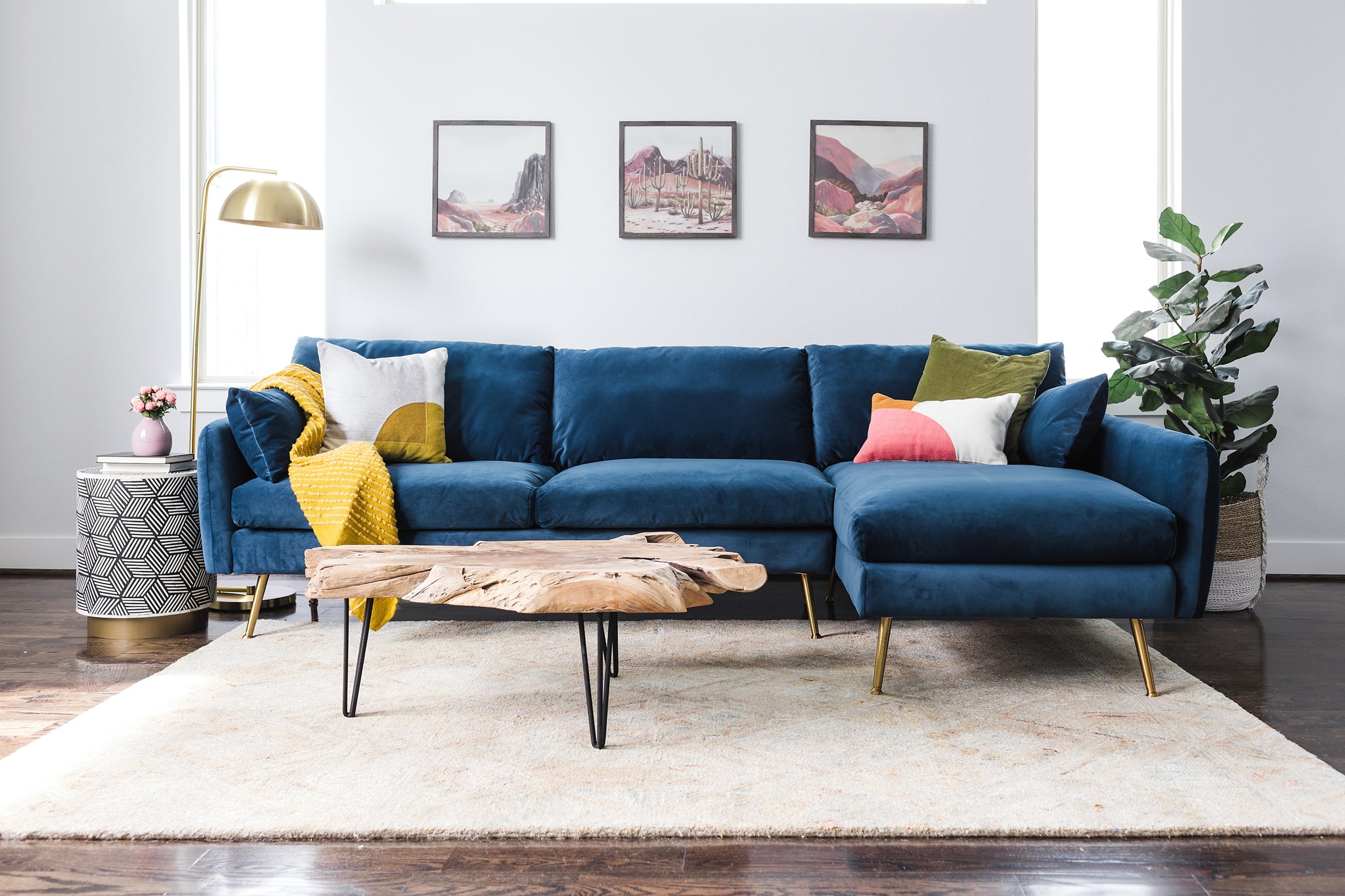 park sectional sofa shown in blue velvet with gold legs right facing