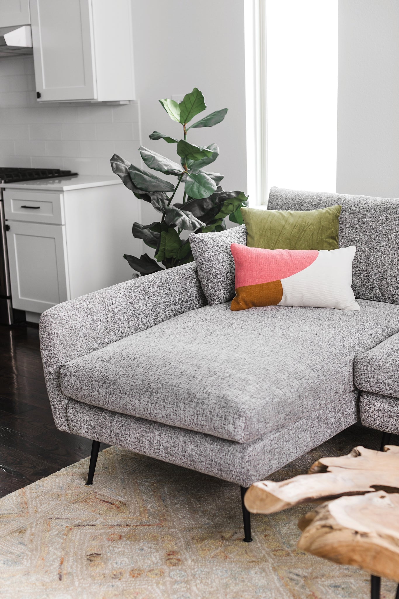 park sectional sofa shown in grey fabric with black legs left facing