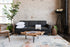 charcoal walnut | Albany sleeper sofa in charcoal with walnut legs in a living room setting