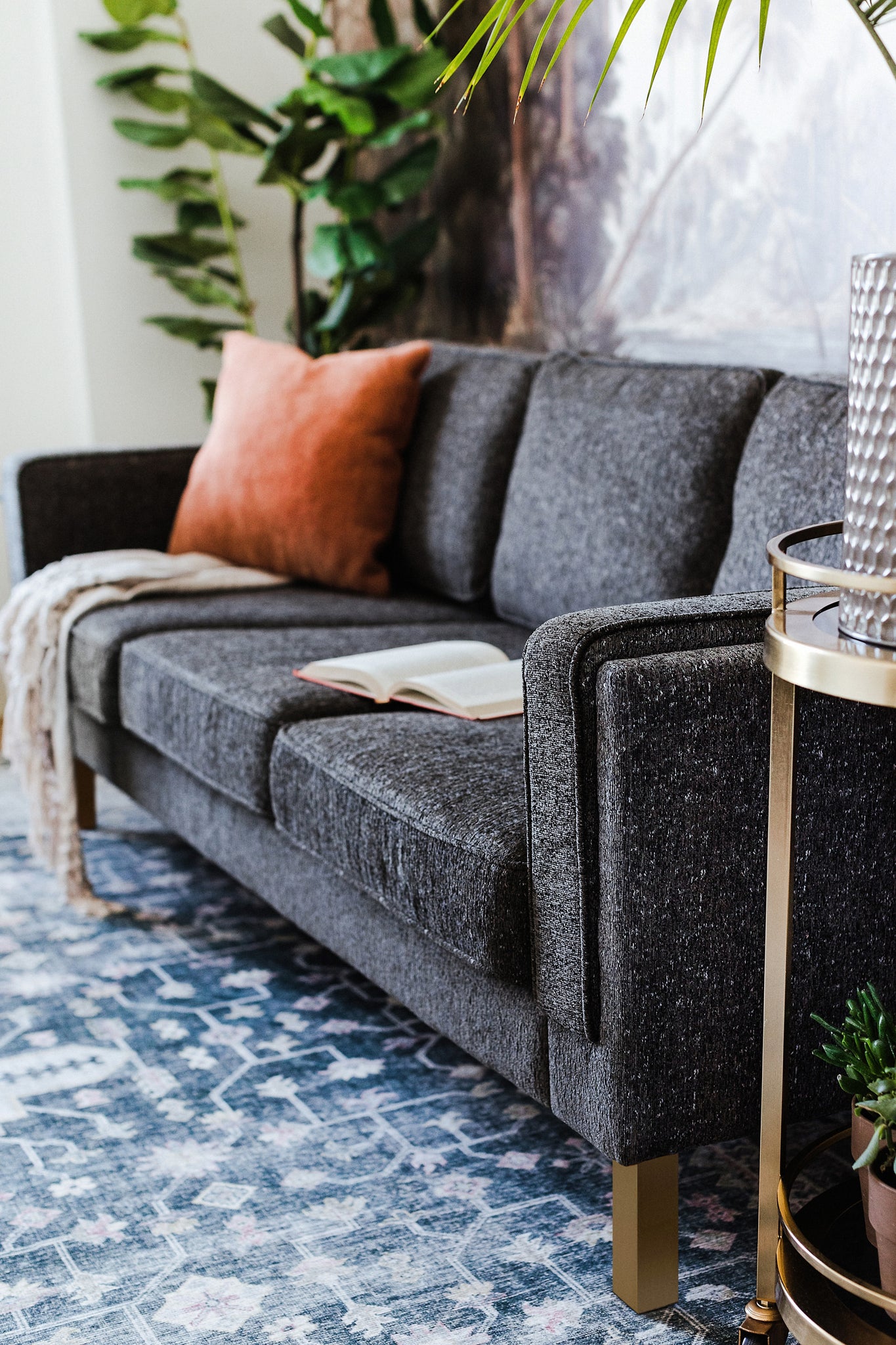 albany sofa shown in charcoal with gold legs