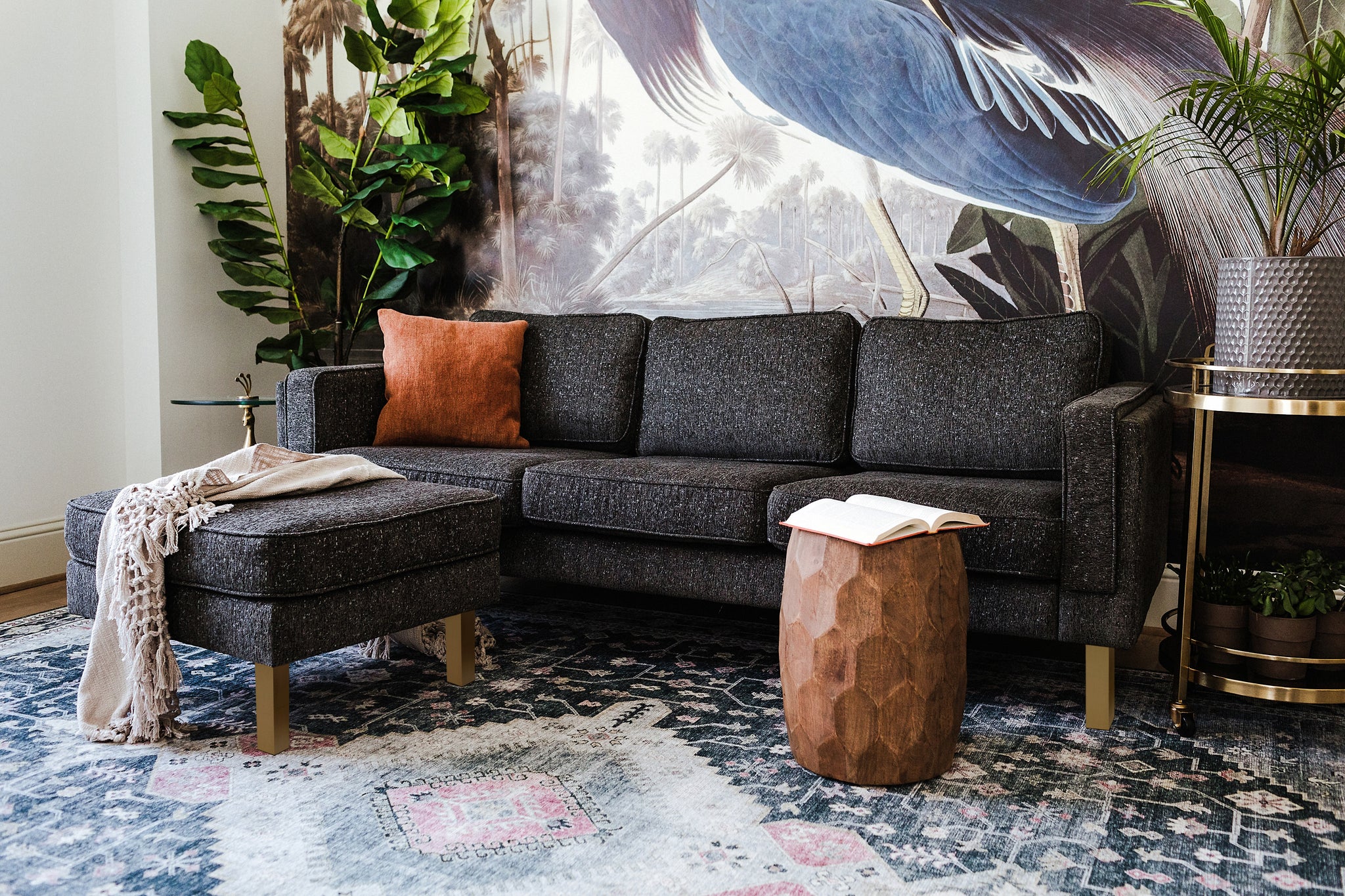 albany sofa shown in charcoal with gold legs