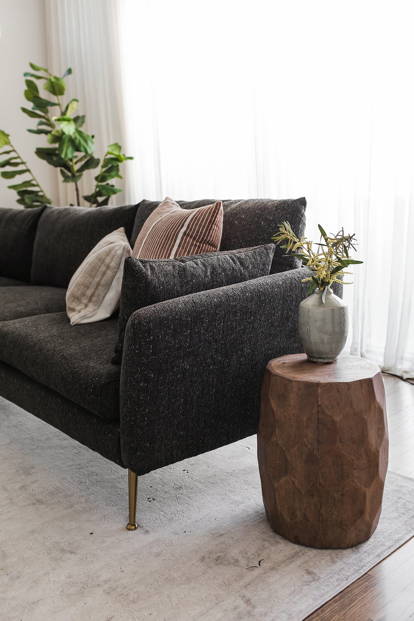 park sectional sofa shown in charcoal with gold legs with black legs left facing