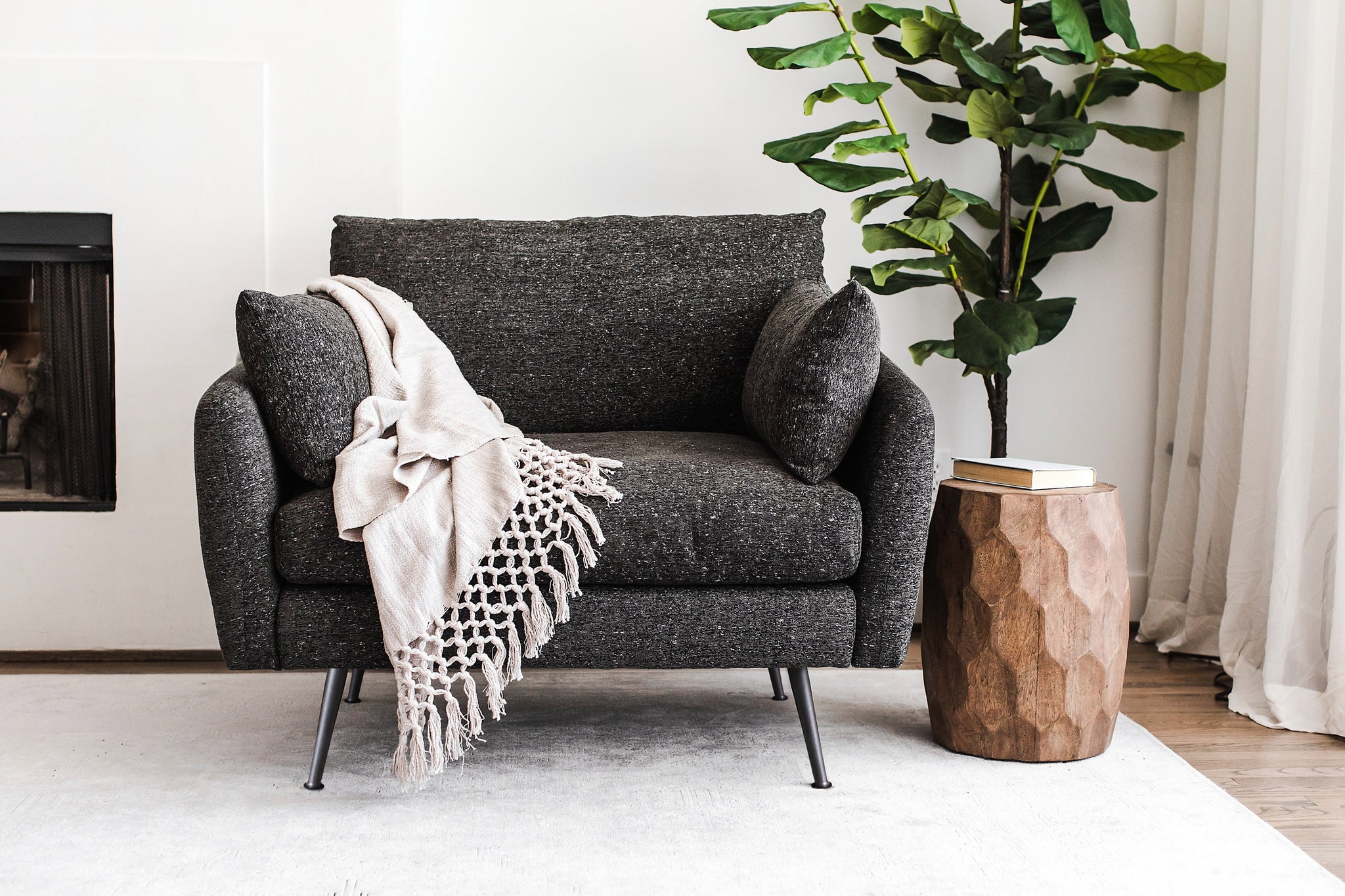 park armchair shown in charcoal with black legs