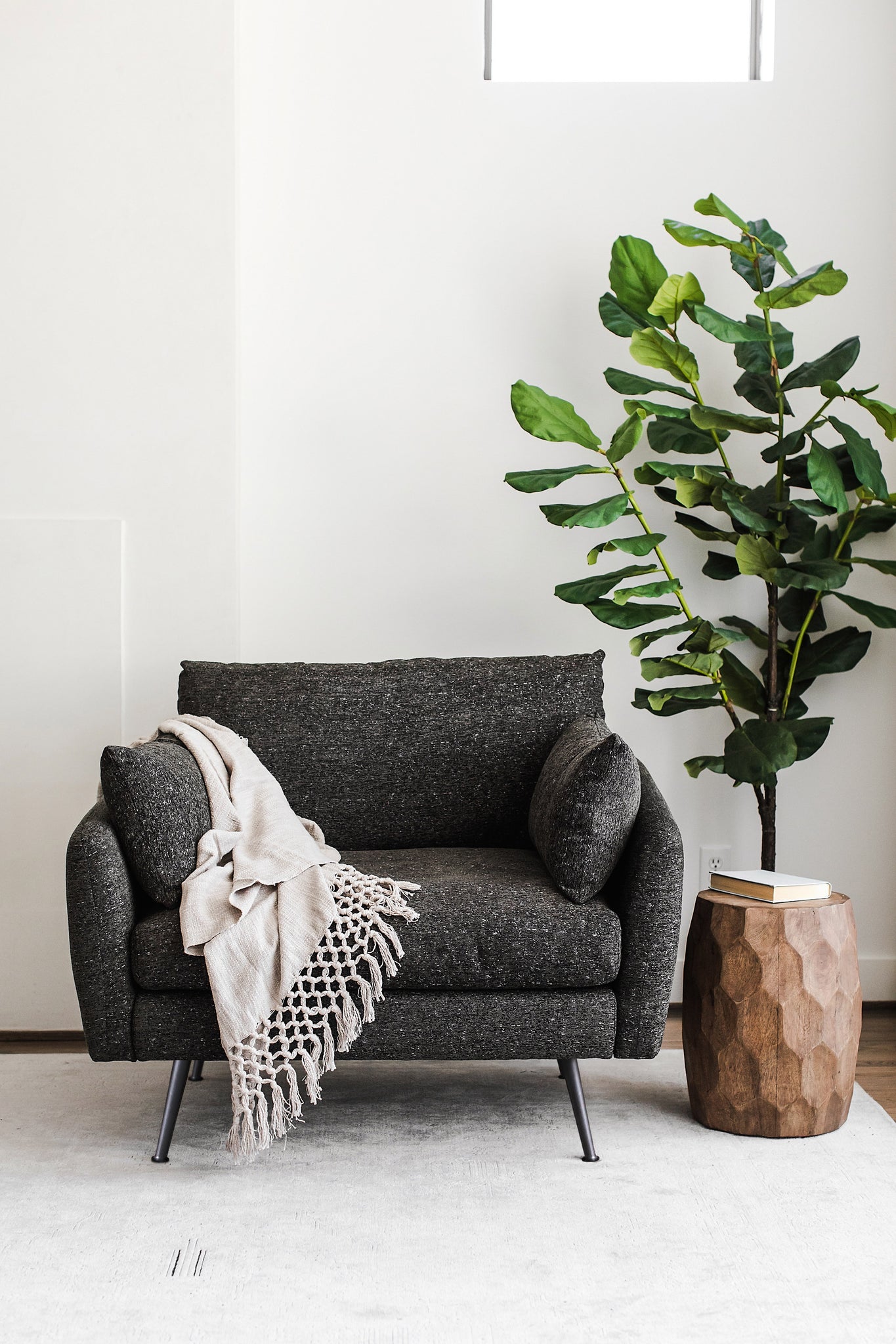 park armchair shown in charcoal with black legs