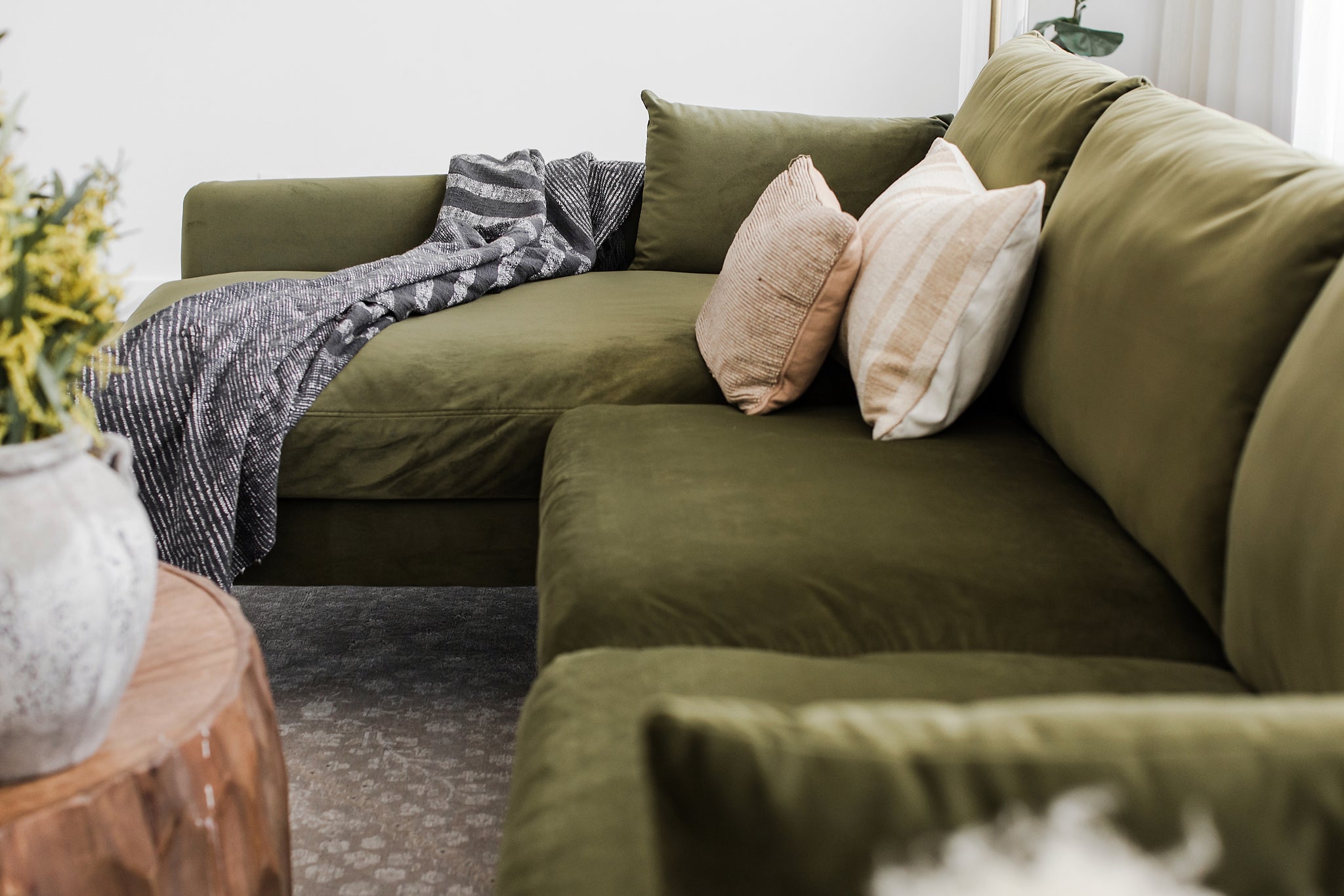 park sectional sofa shown in olive velvet with gold legs left facing