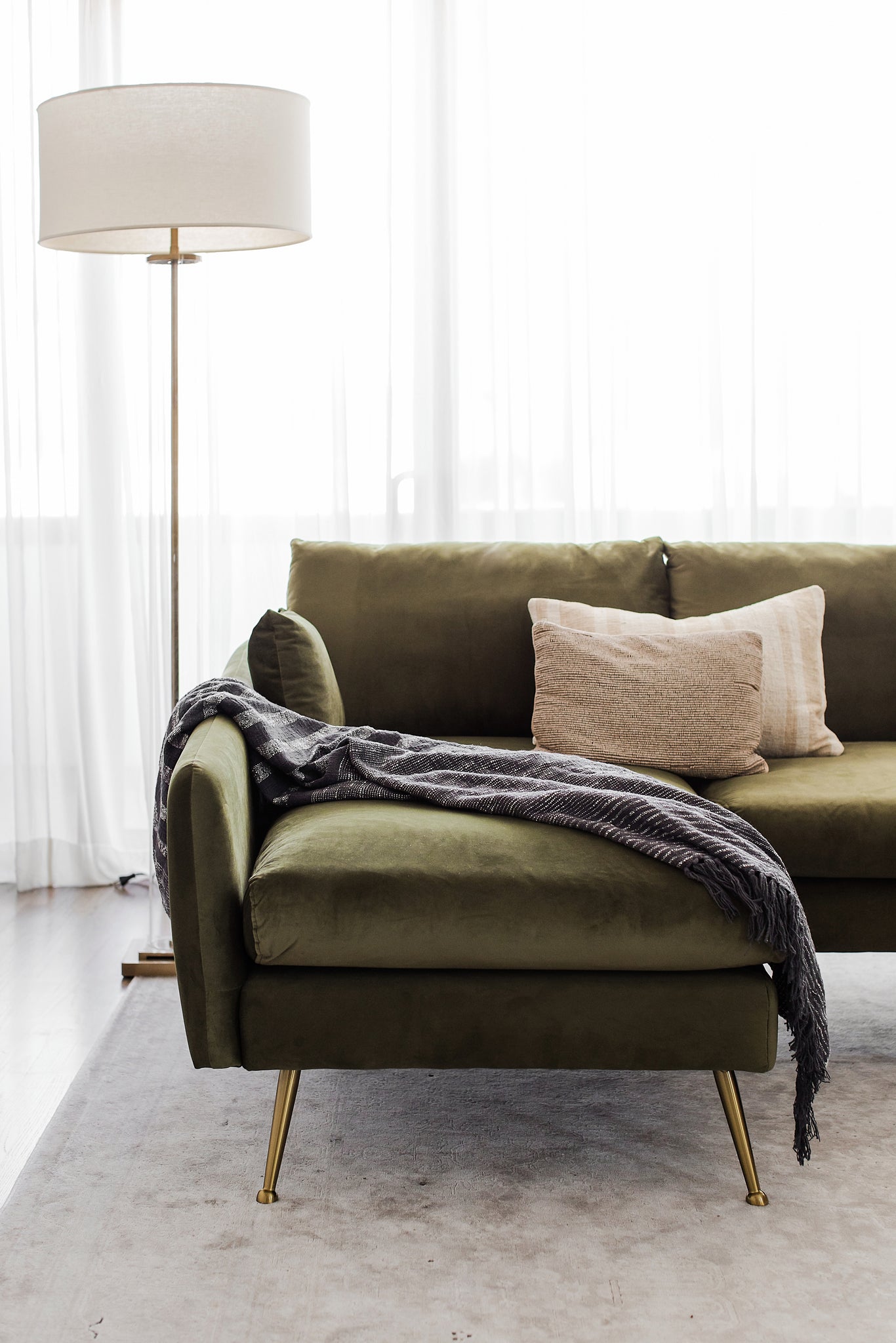 park sectional sofa shown in olive velvet with gold legs left facing