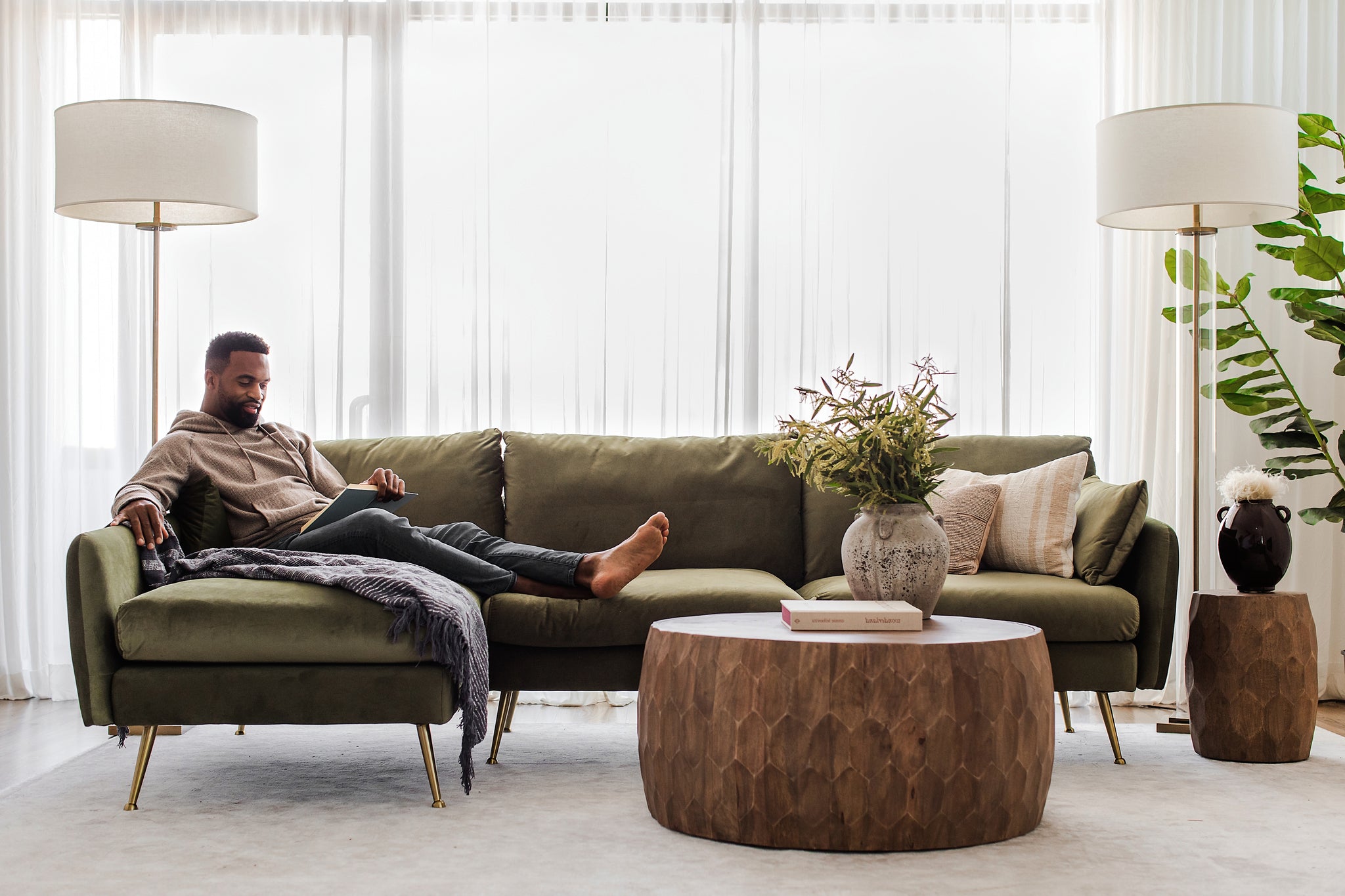 park sectional sofa shown in olive velvet with gold legs left facing