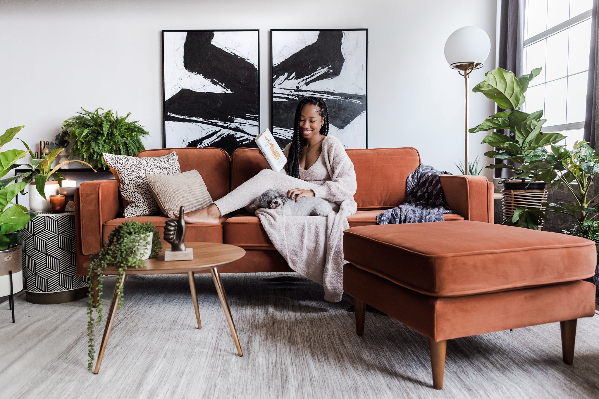 albany ottoman shown in rust velvet with walnut legs