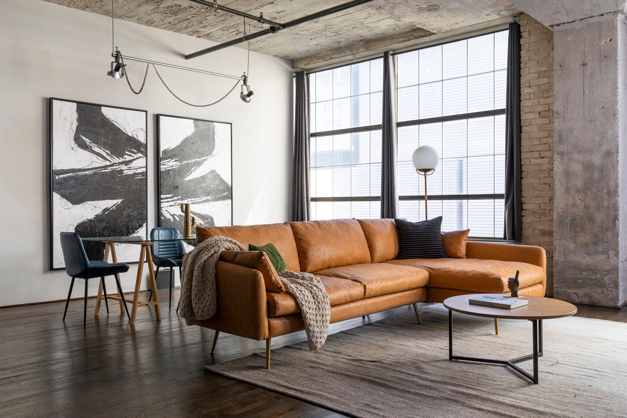 park sectional sofa shown in distressed vegan leather with gold legs right facing