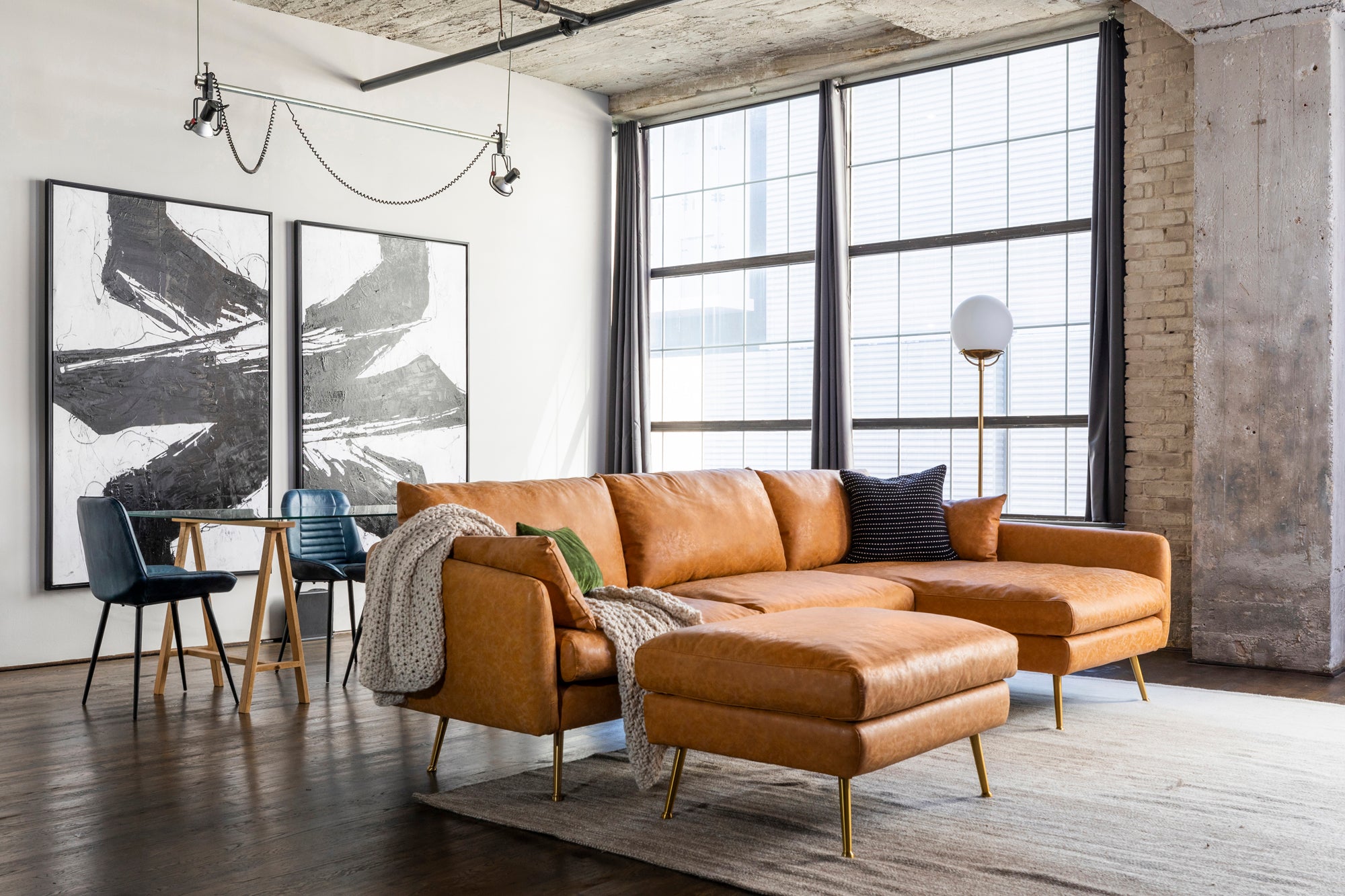 park sectional sofa shown in distressed vegan leather with gold legs right facing