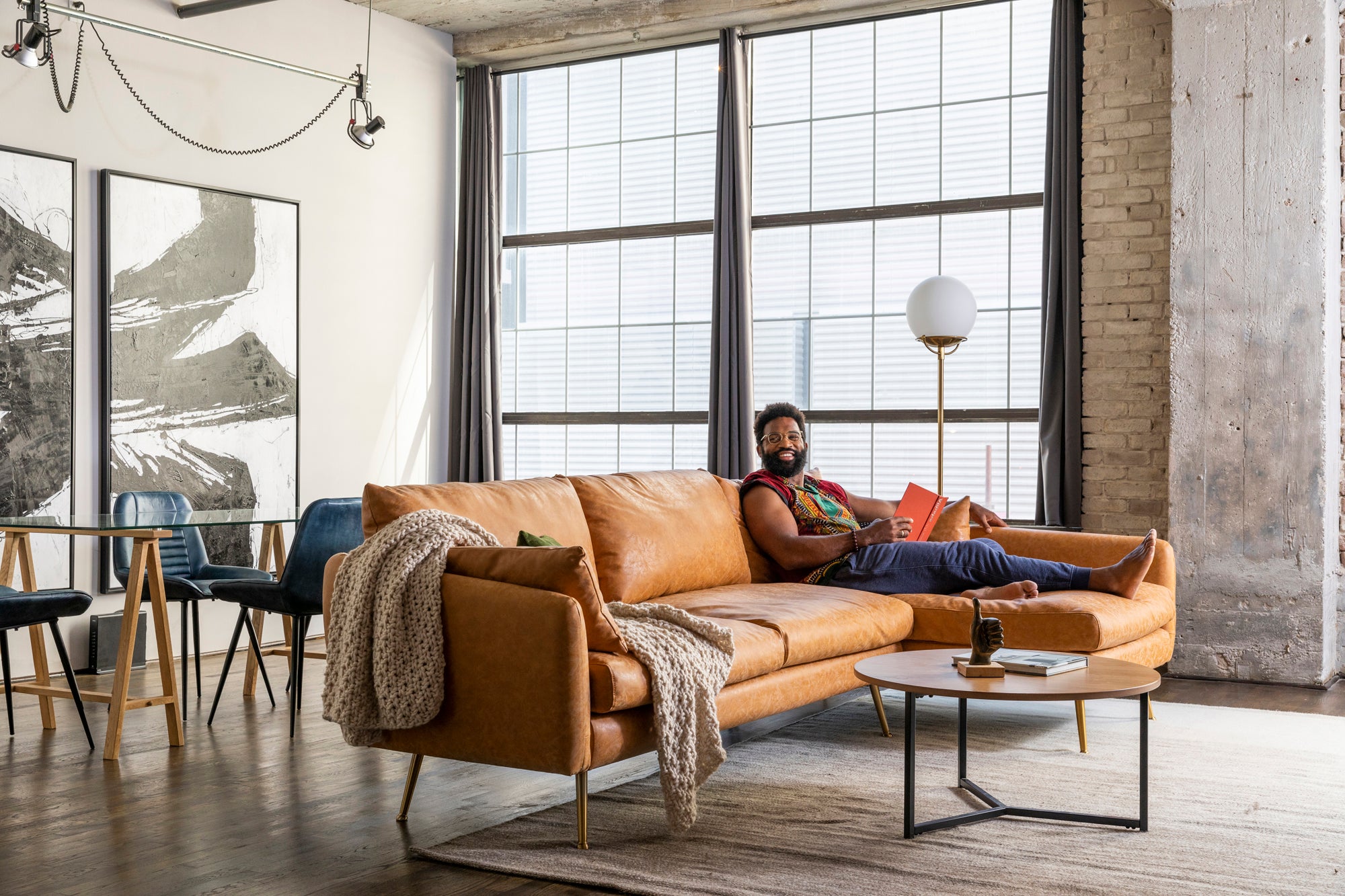 park sectional sofa shown in distressed vegan leather with gold legs right facing