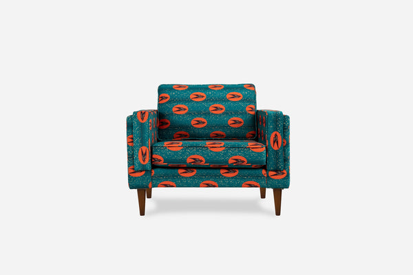 ẹkáàbọ̀ albany armchair shown in akwaaba velvet with walnut legs