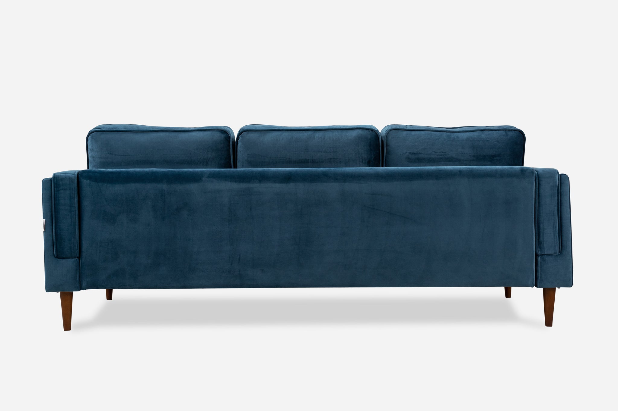 albany sofa shown in blue velvet with walnut legs