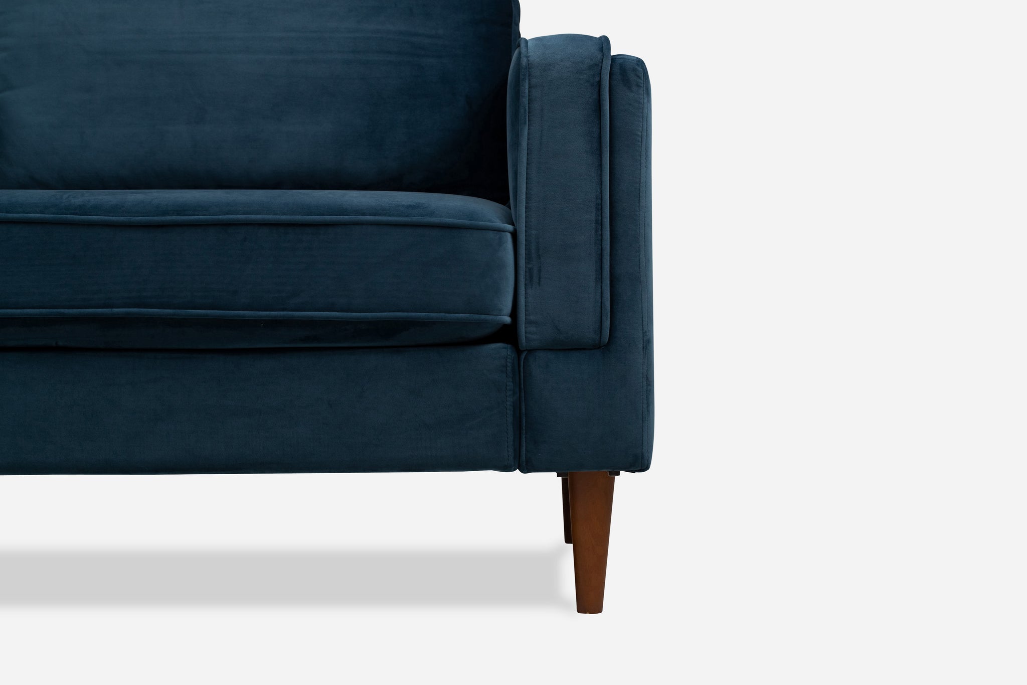 albany armchair shown in blue velvet with walnut legs