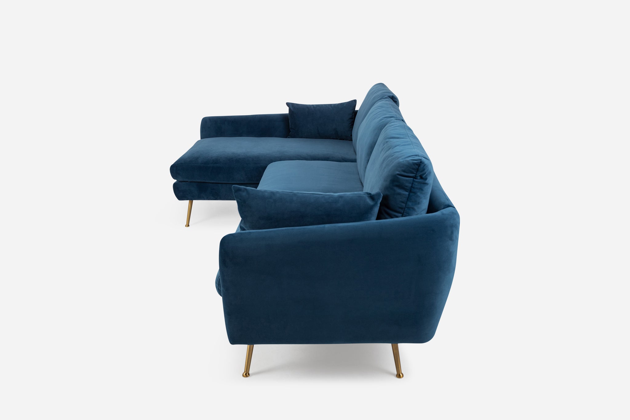 park sectional sofa shown in blue velvet with gold legs left facing